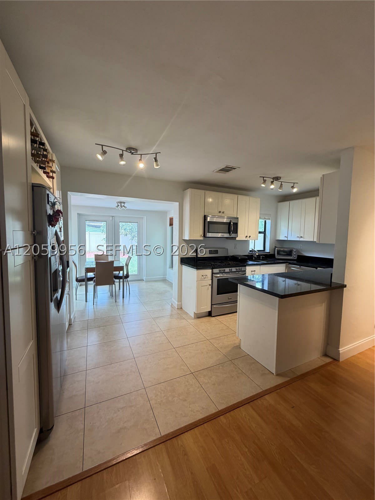 6717 Raleigh St – photo 1