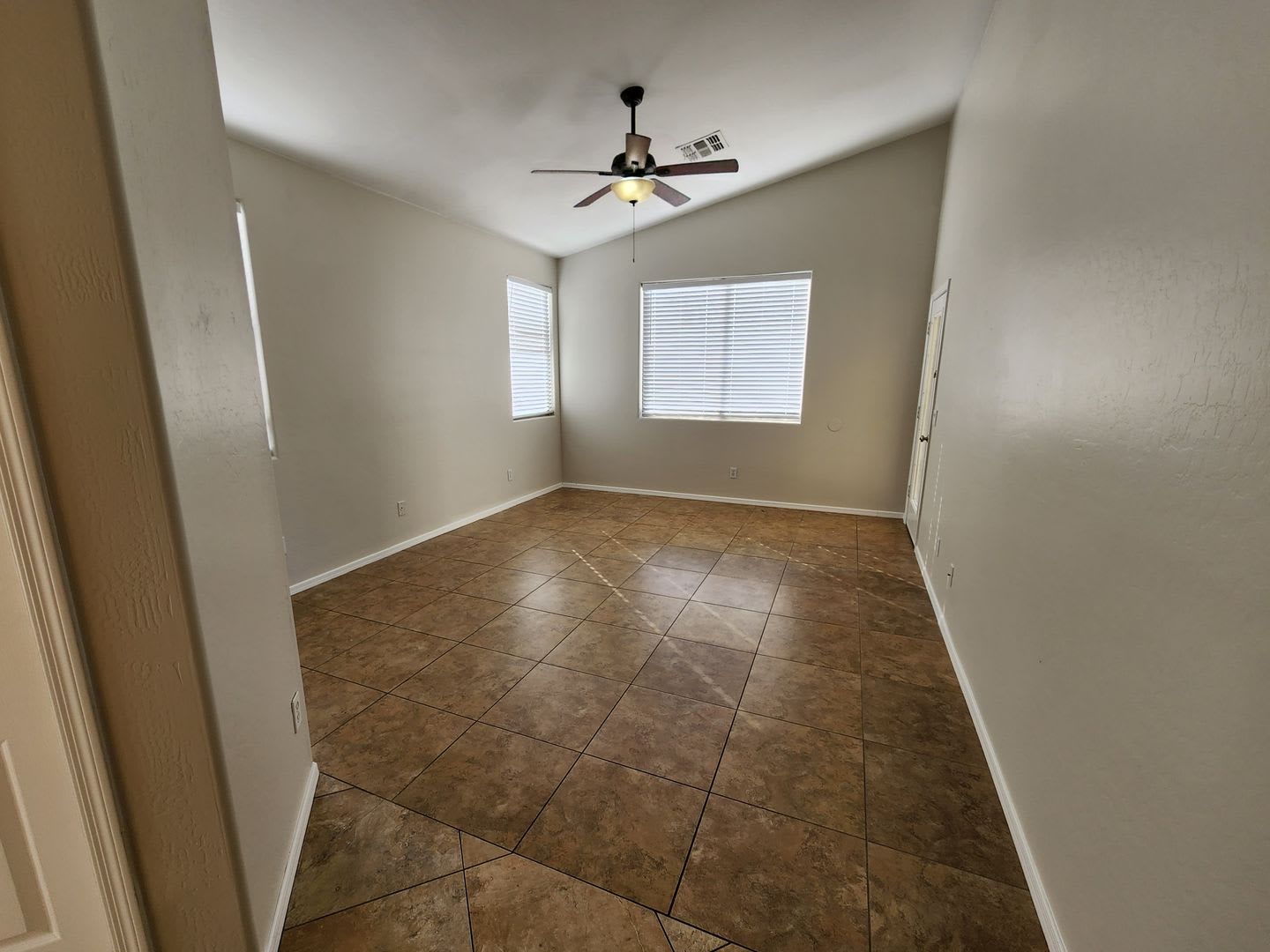 Vaulted ceilings, split bedroom floor plan, tile flooring throughout – photo 5