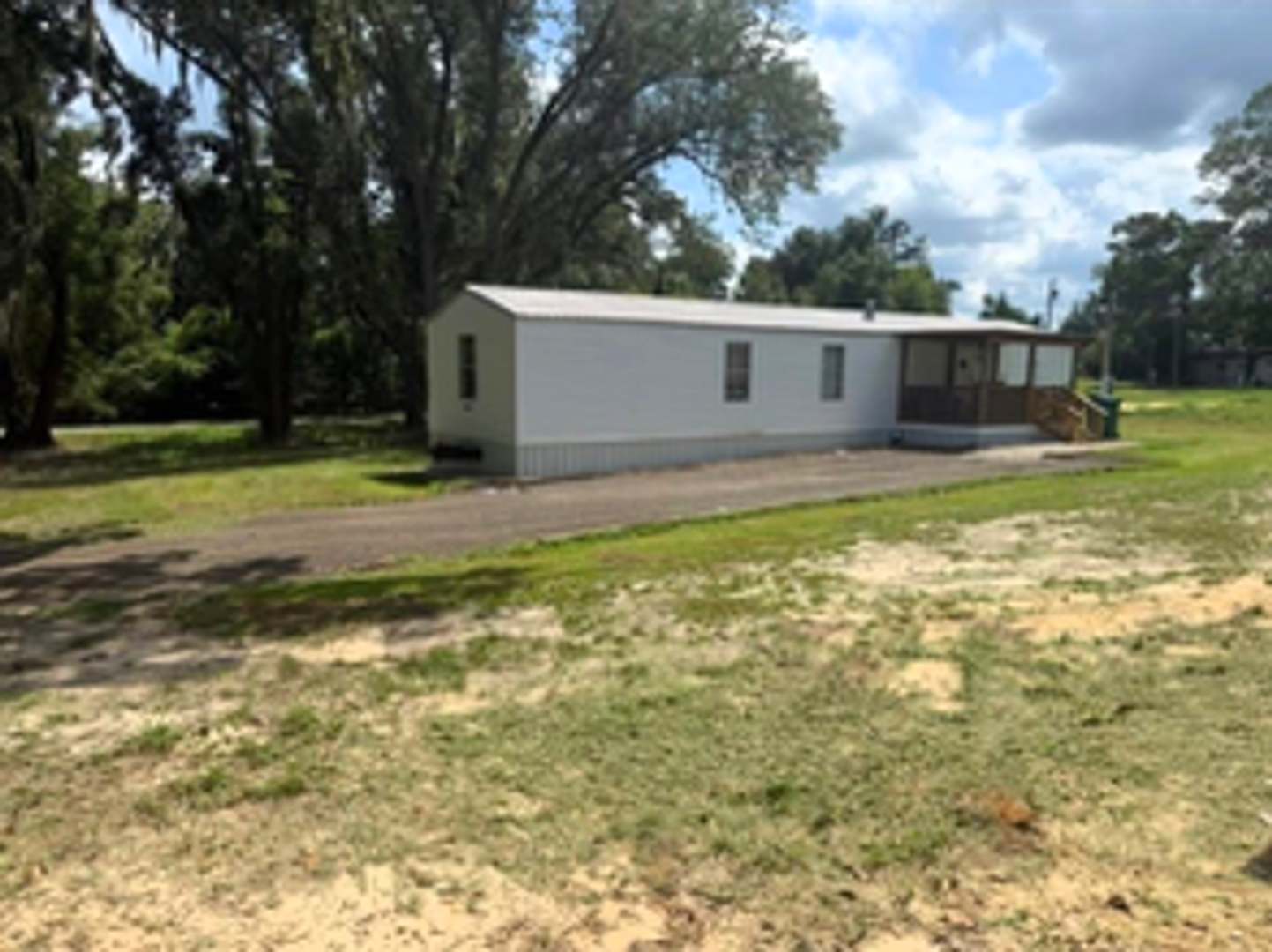 Pleasant 3/1 Mobile Home in Marianna w/ Lawn Maintenance and Pest Control Included – photo 2