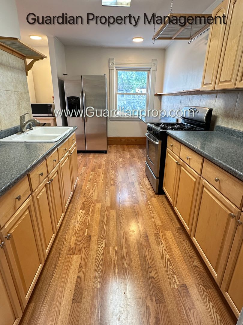 Linden Hills Upper Level Duplex, Sunroom, In Unit Laundry, Dishwasher, Garage Space Included – photo 2