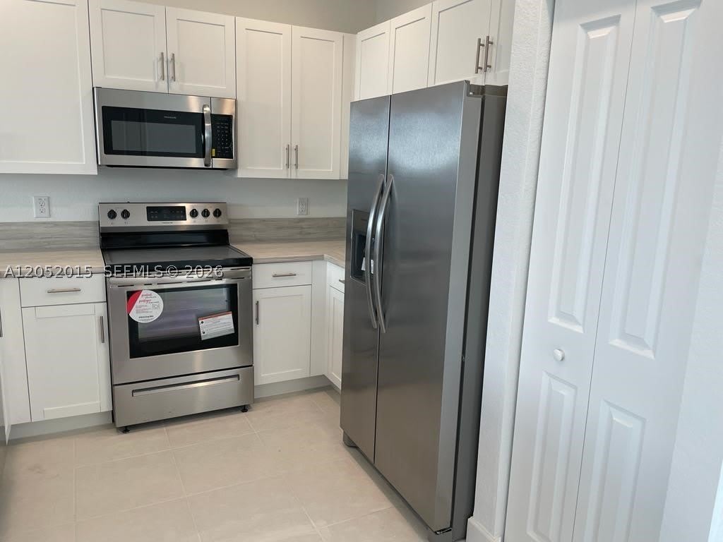 825 NE 211th St – photo 3