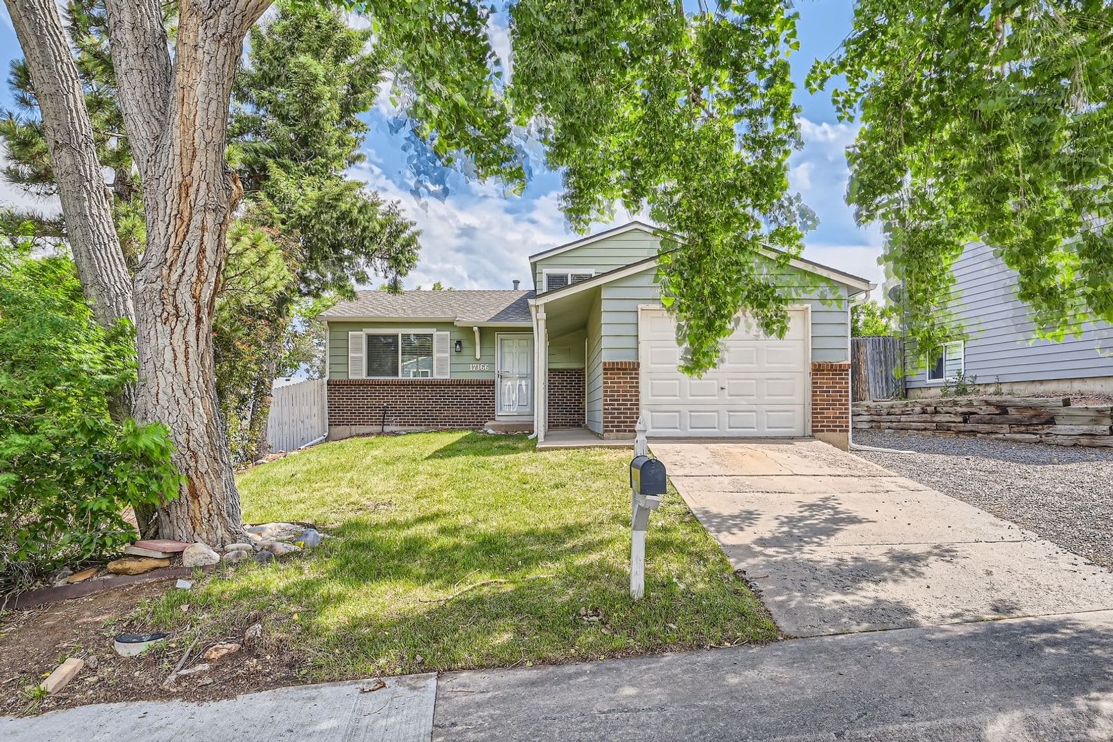 Spacious 3-Bedroom Aurora Home with Fenced Yard, Garage & Central AC – photo 1