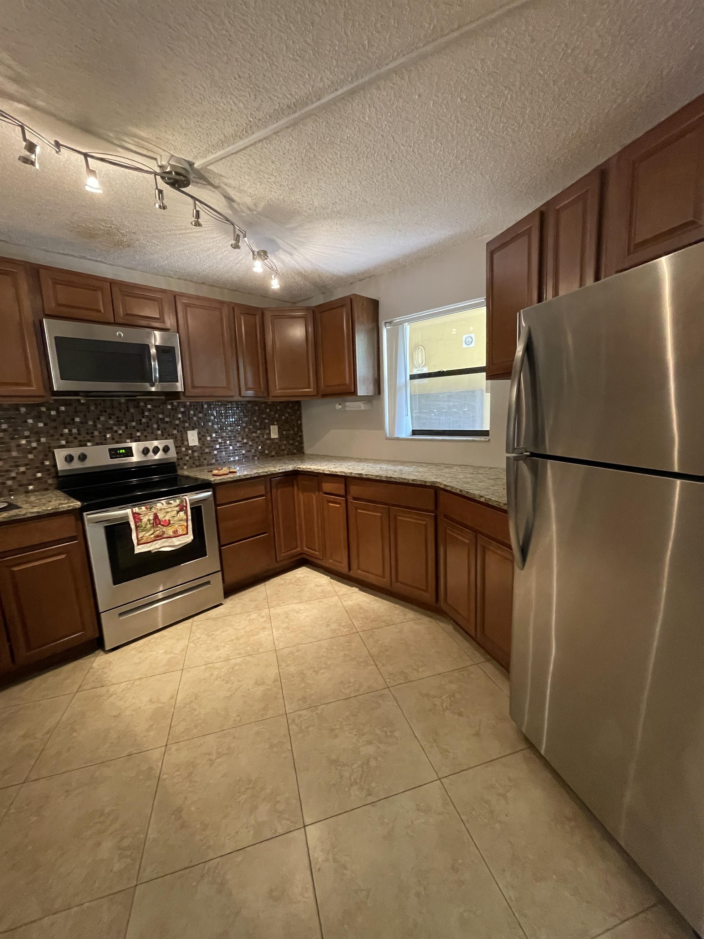 9044 NW 28th Dr #3-106 – photo 4