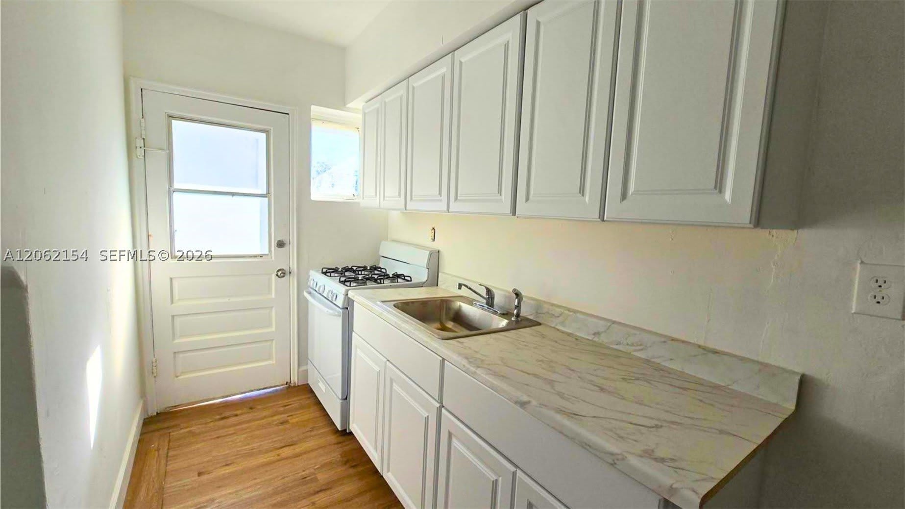 660 84th St – photo 2