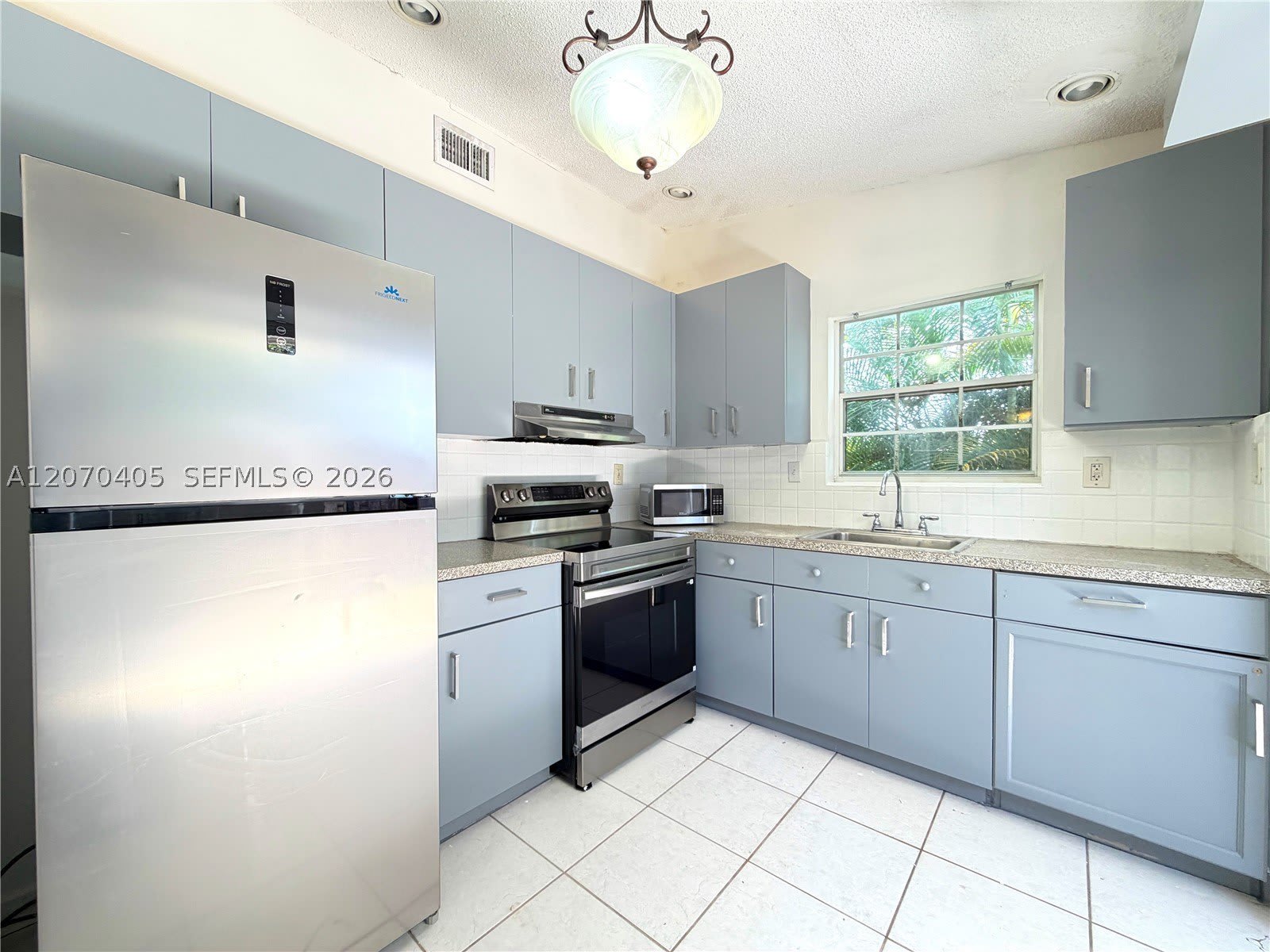 9850 W Heather Ln – photo 2