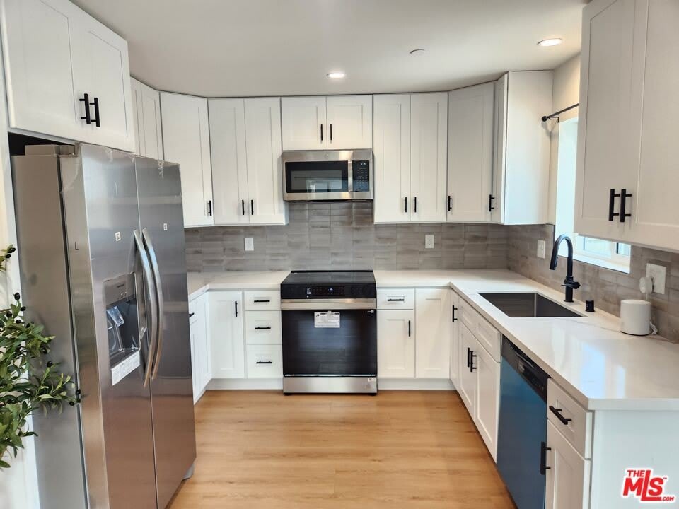 1154 W 67th St – photo 5
