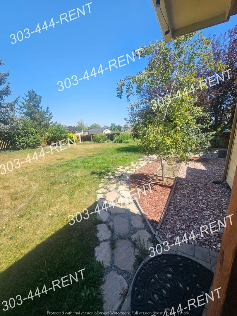 Back to School Special!!! Spacious 5-Bedroom Thornton Home with Finished Basement & 3-Car Garage – photo 4