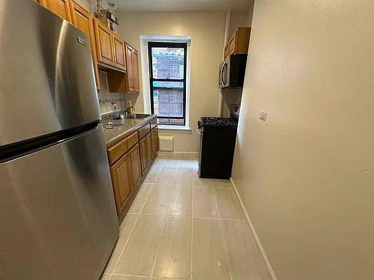 308 East 209th Street – photo 1
