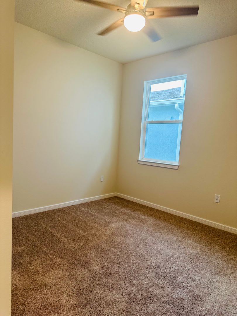 Welcome to this BRAND NEW 4-bedroom, 2-bathroom home located in the community of Canopy Terrace – photo 5