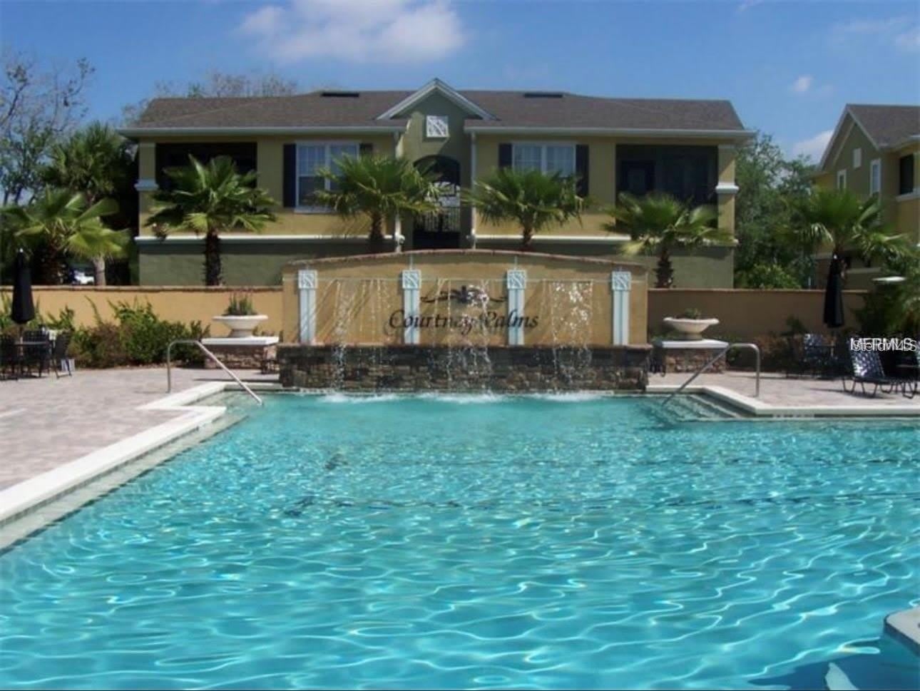 10025 COURTNEY PALMS Boulevard – photo 2