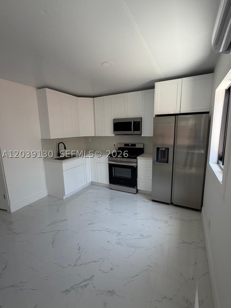 1230 NW 135th St – photo 3
