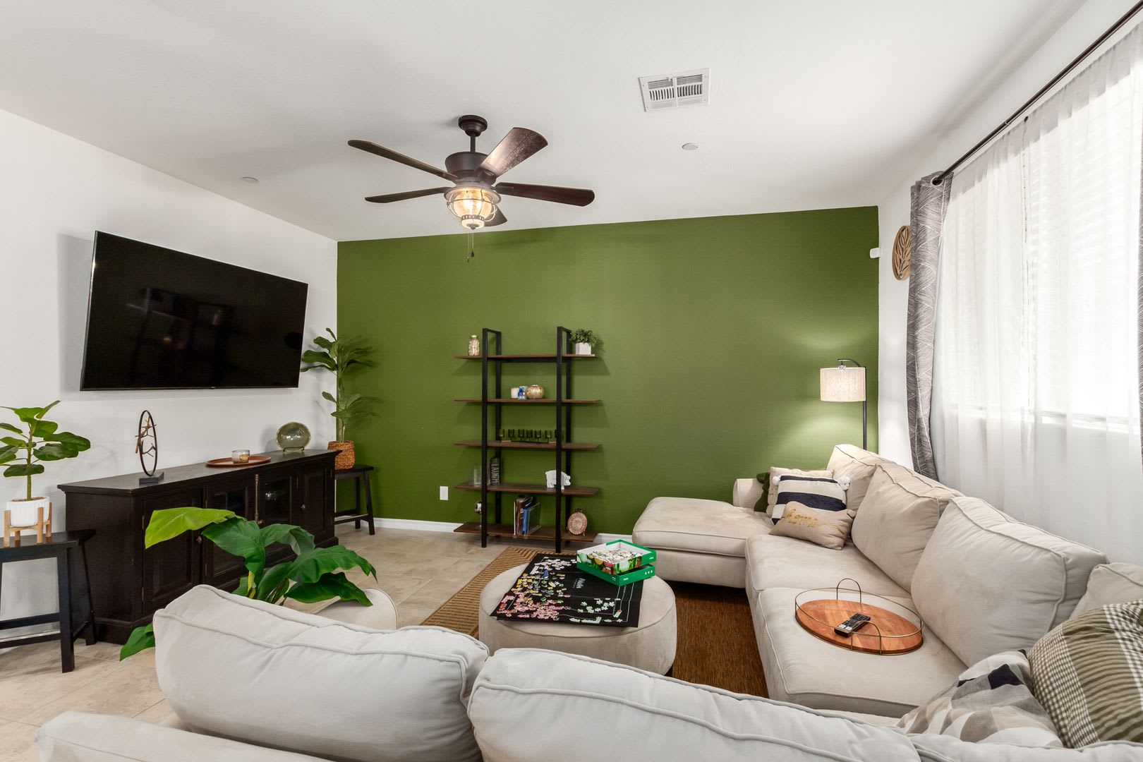 Beautiful corner lot townhome with custom paint, plentiful community green spaces. – photo 5