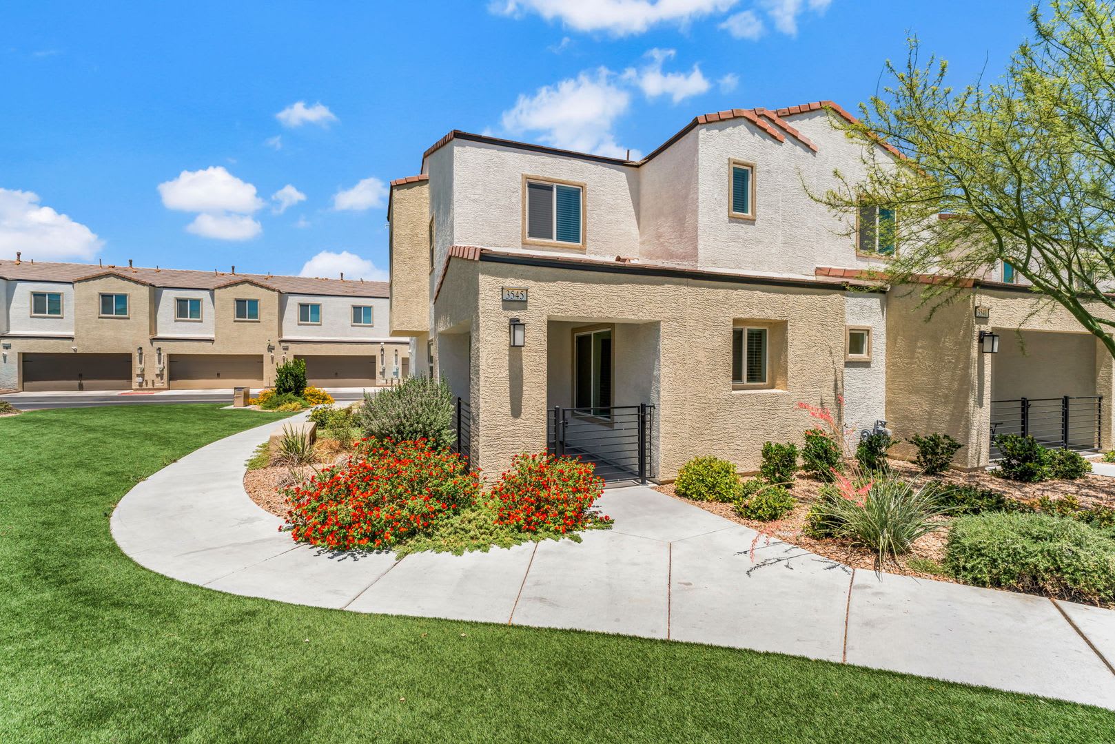 Modern Gated Townhome Living with Resort-Style Community Amenities – photo 1
