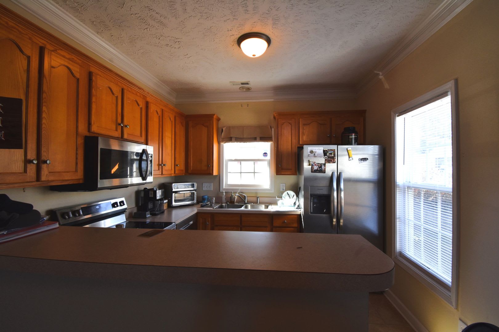 2 Weeks Free on First Full Months Rent~ 3 Bedroom 2.5 Bathroom Townhome~ Large Corner Lot – photo 5