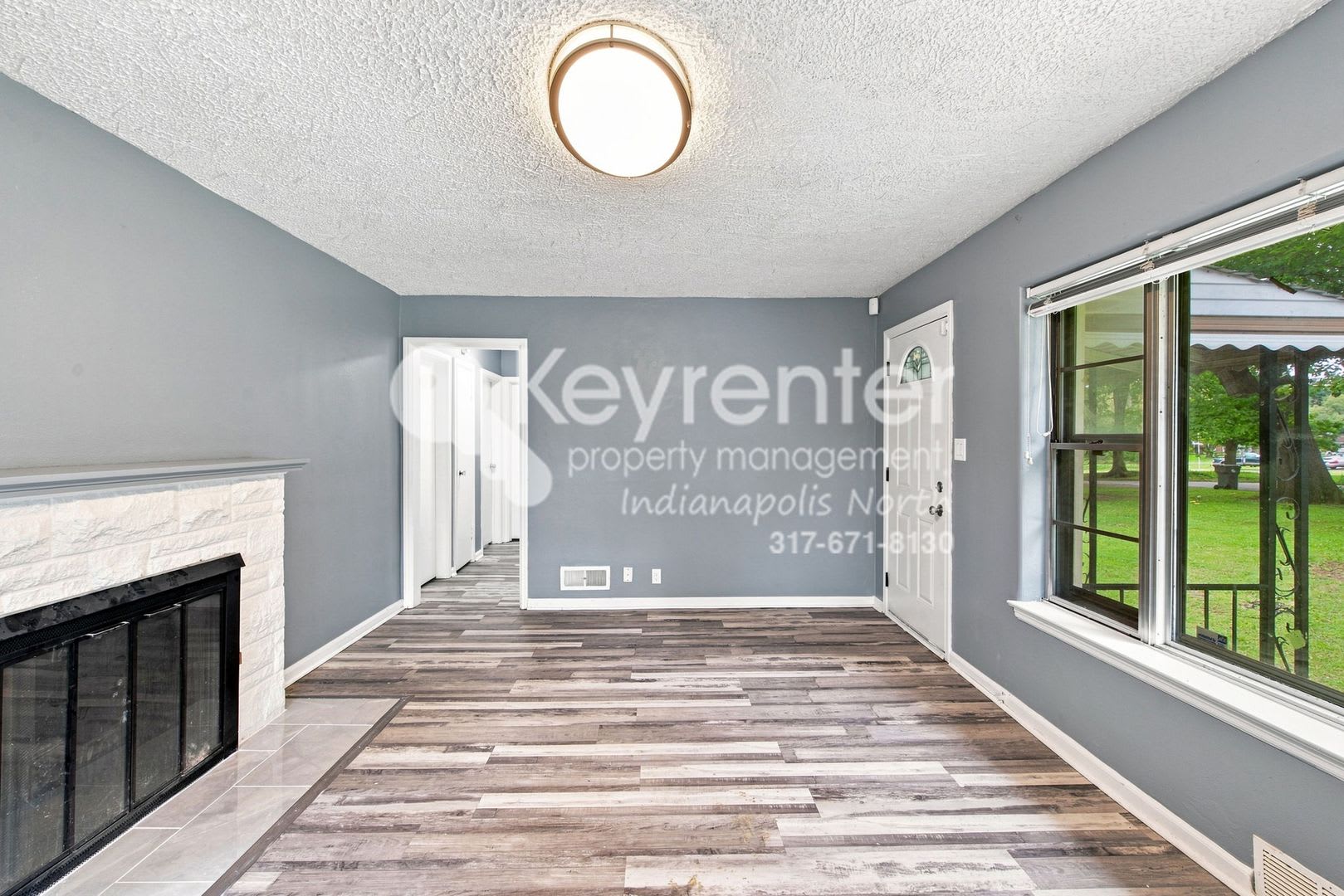 Well Situated 3 Bedroom Corner Lot Home With Fenced Yard Fireplace – photo 4