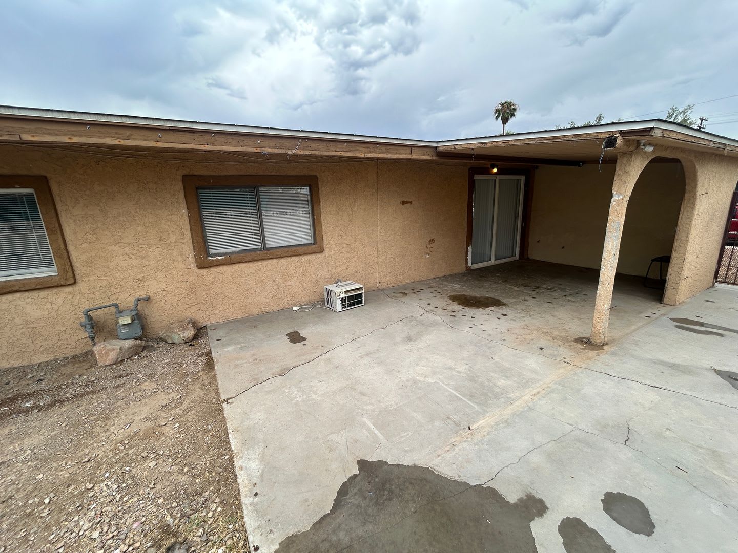 Single story home with large backyard and huge carport with plenty of storage. – photo 4