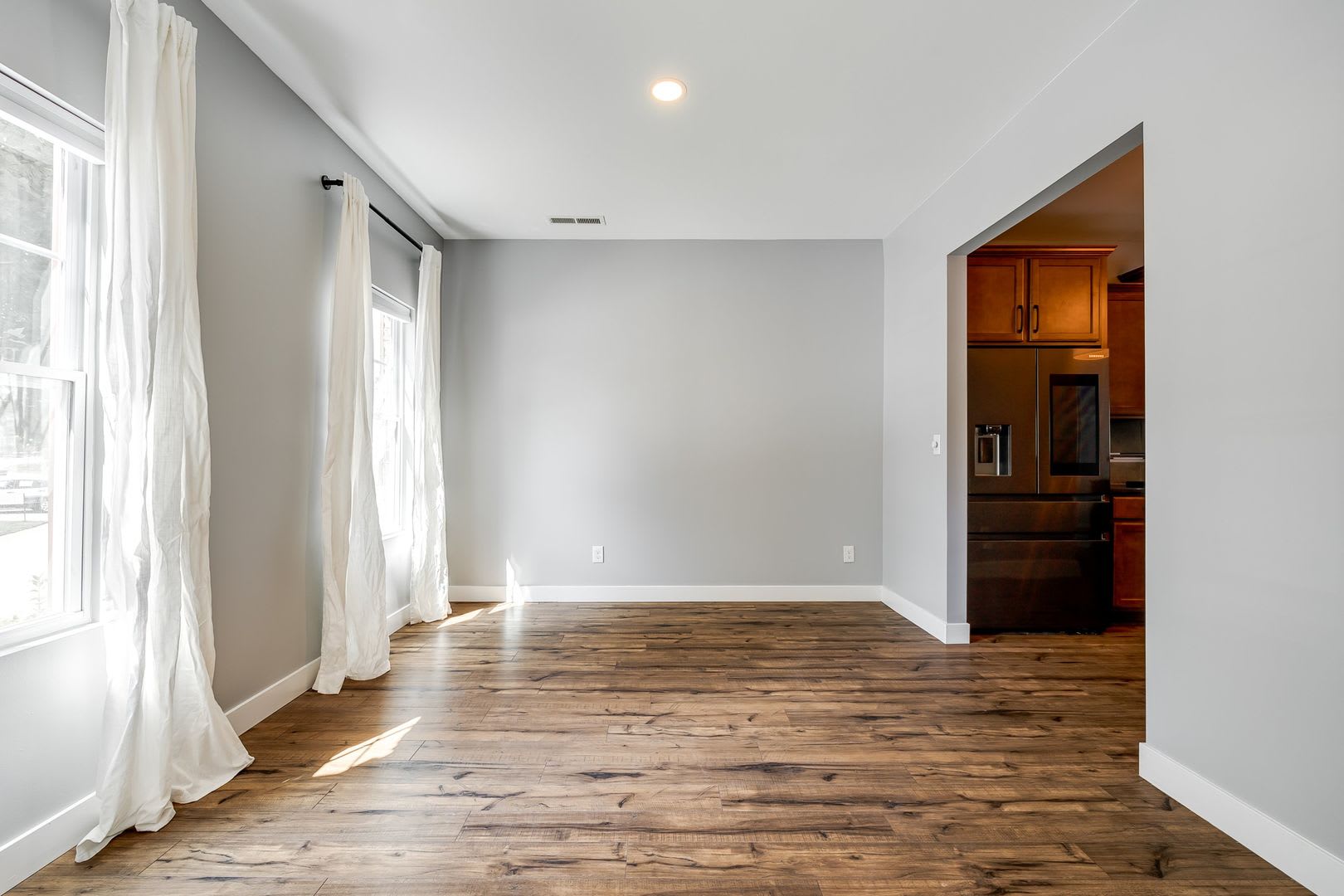 This 3-bedroom, 2.5-bath end-unit townhome in the gated community of Harpers Green is a Gem! – photo 5