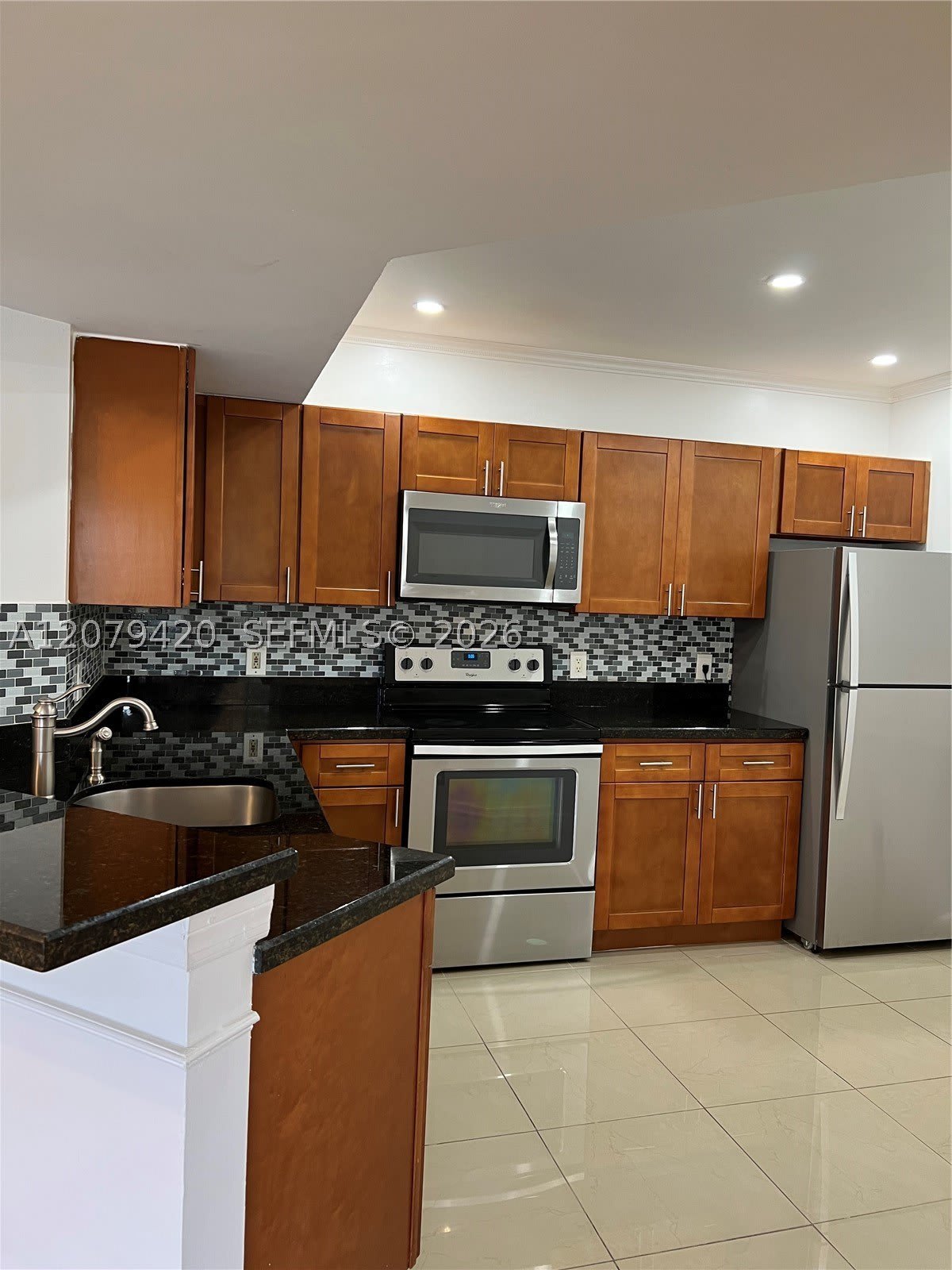 8721 Wiles Rd – photo 5