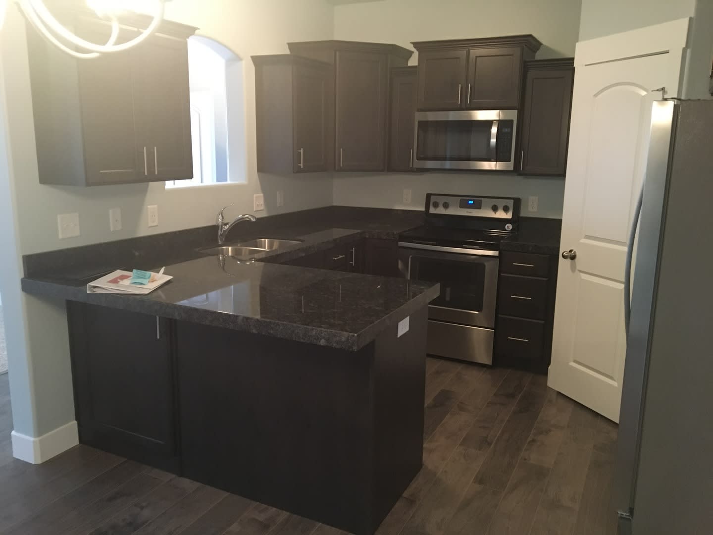 Brand New 3 Bed 2 Bath Condo! – photo 1