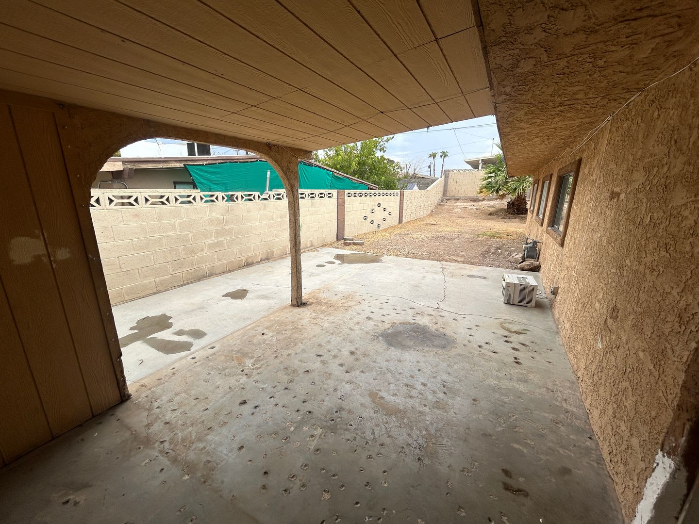 Single story home with large backyard and huge carport with plenty of storage. – photo 3