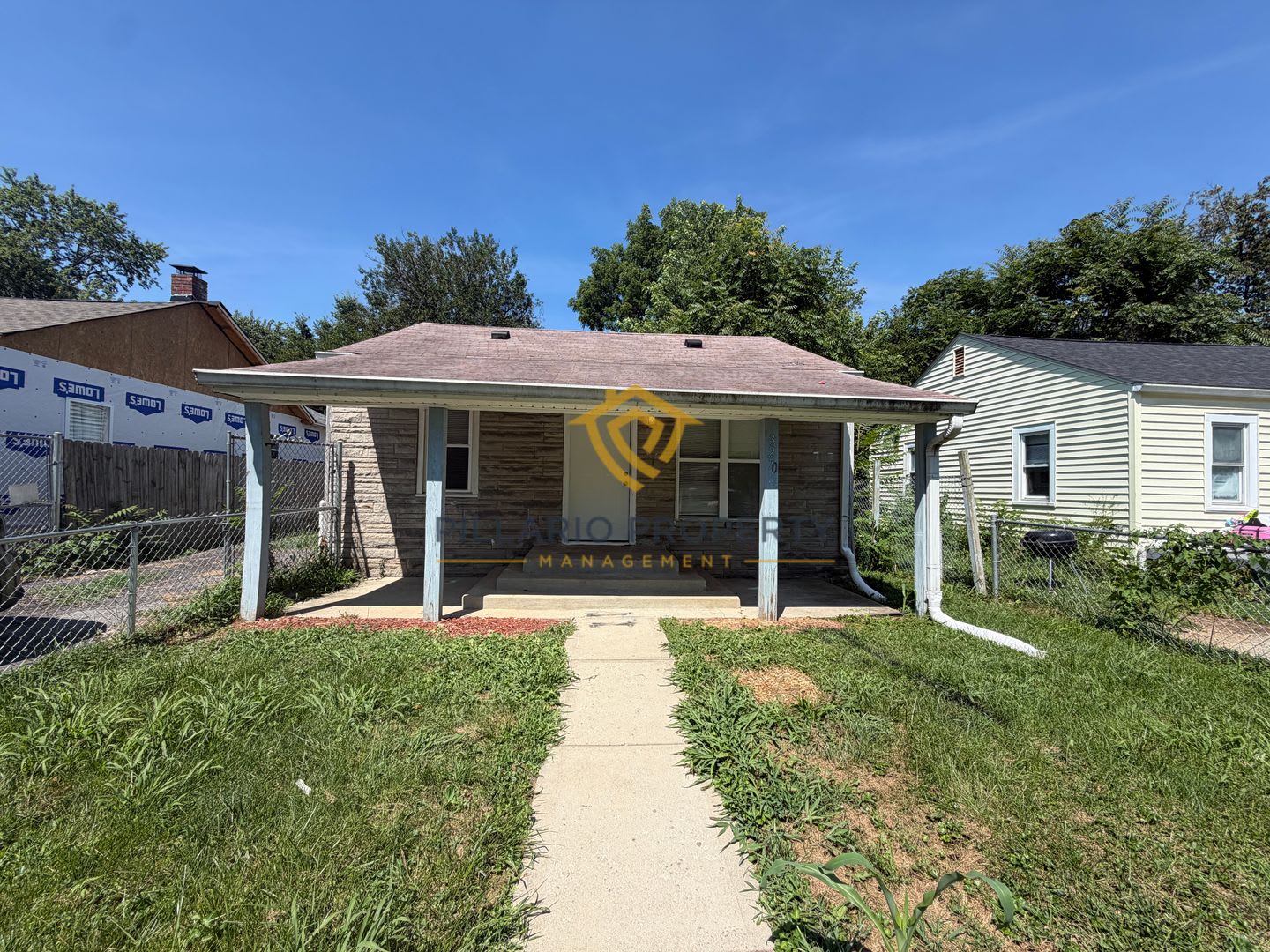 Charming 3-Bedroom Stone Bungalow with 2-Car Detached Garage & Fenced Yard, Available NOW! – photo 1