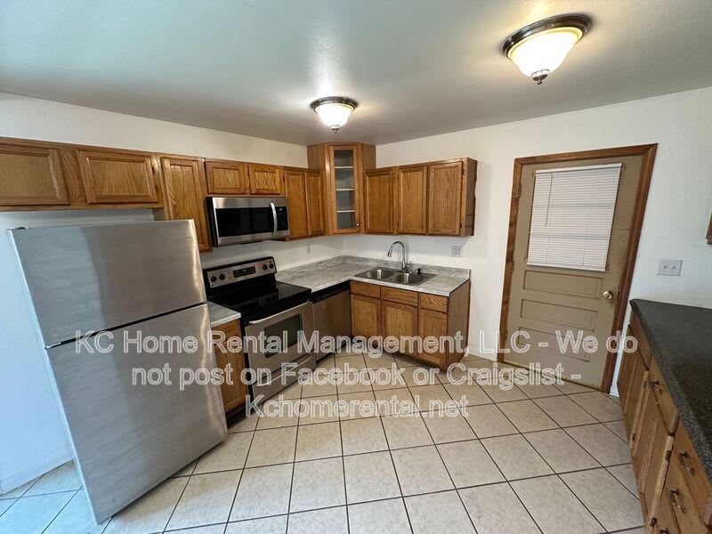 12211 E 52nd Terrace – photo 3