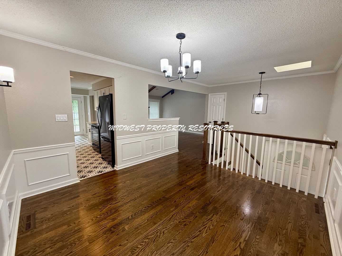 Newly Remodeled 3 Bed, 2.5 Bath Home with Vaulted Ceilings, Finished Basement & Fenced Yard! – photo 4
