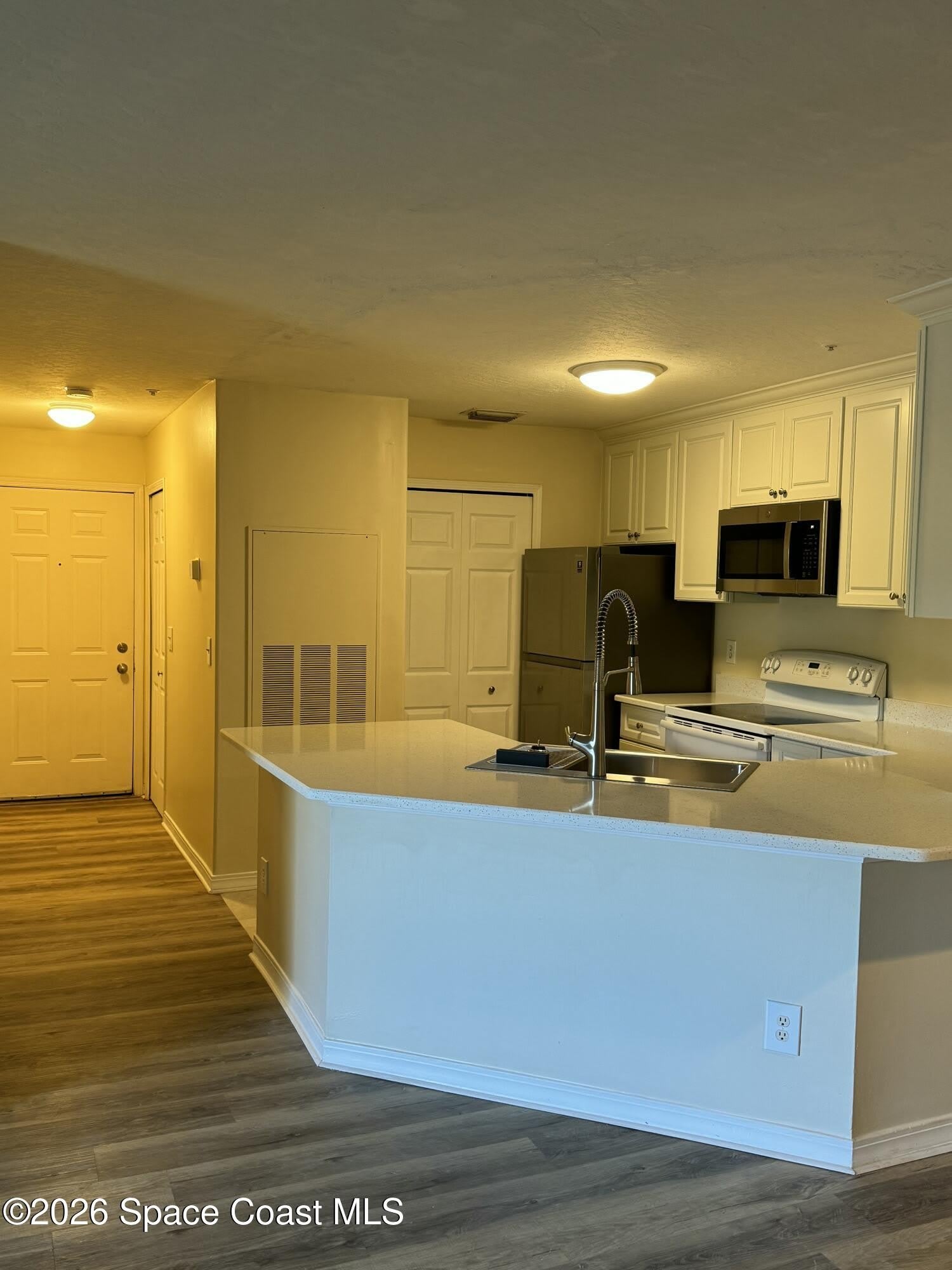 7667 N Wickham Road – photo 5