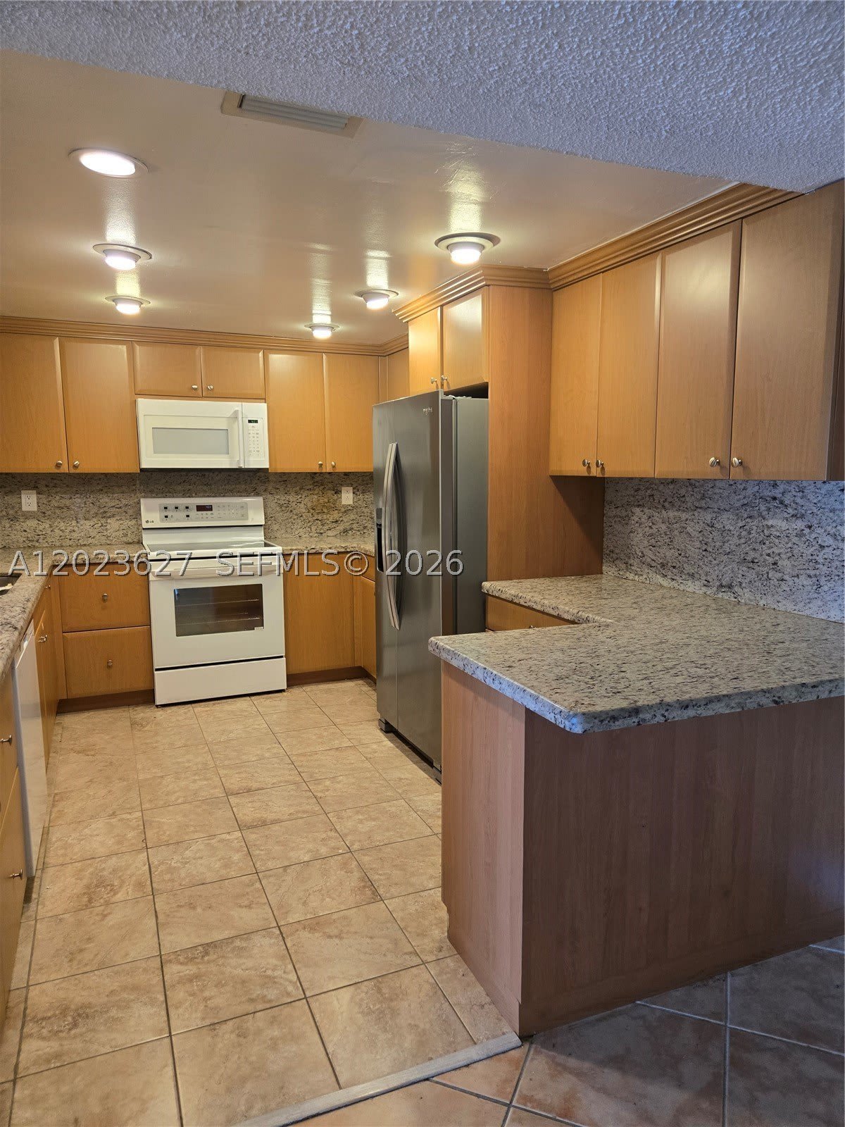9735 NW 52nd St – photo 2