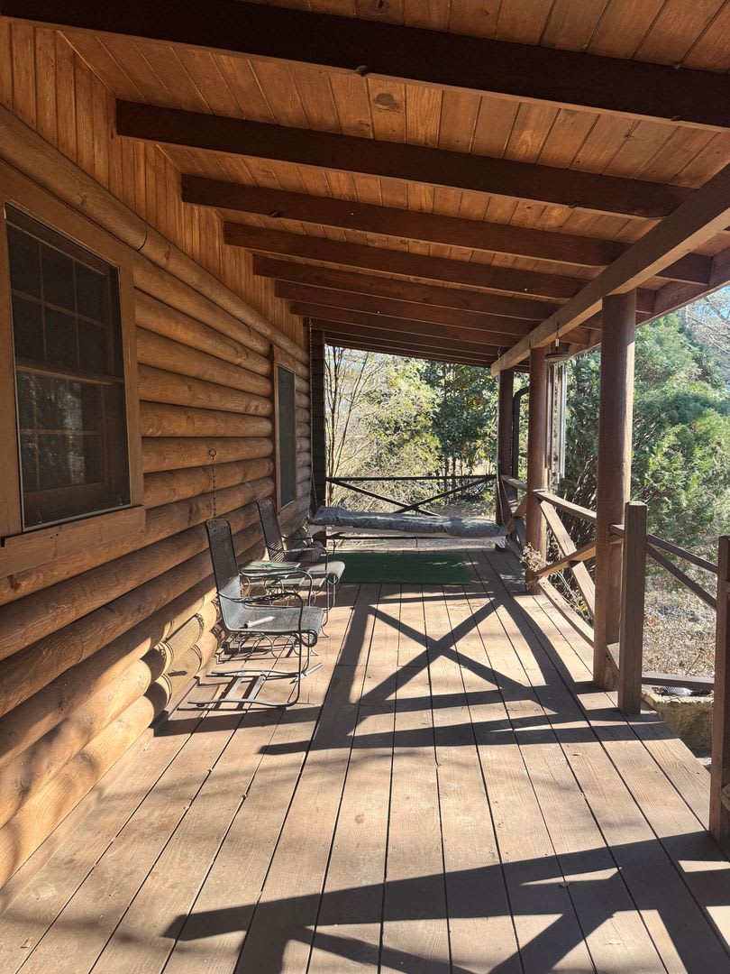 Log Cabin in Oconee on a 1.357 acre neighborhood wooded lot! – photo 3