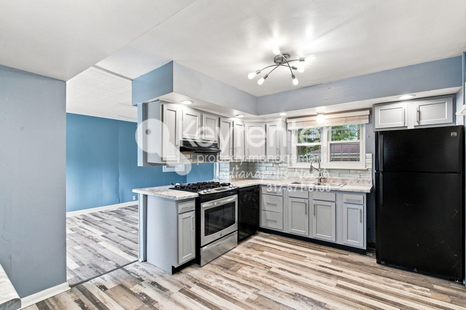 Well Situated 3 Bedroom Corner Lot Home With Fenced Yard Fireplace – photo 3