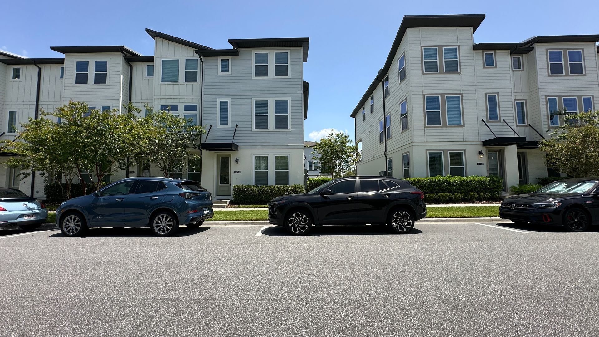 Stunning 3-Story Corner Unit with 3 Private Suites – photo 1