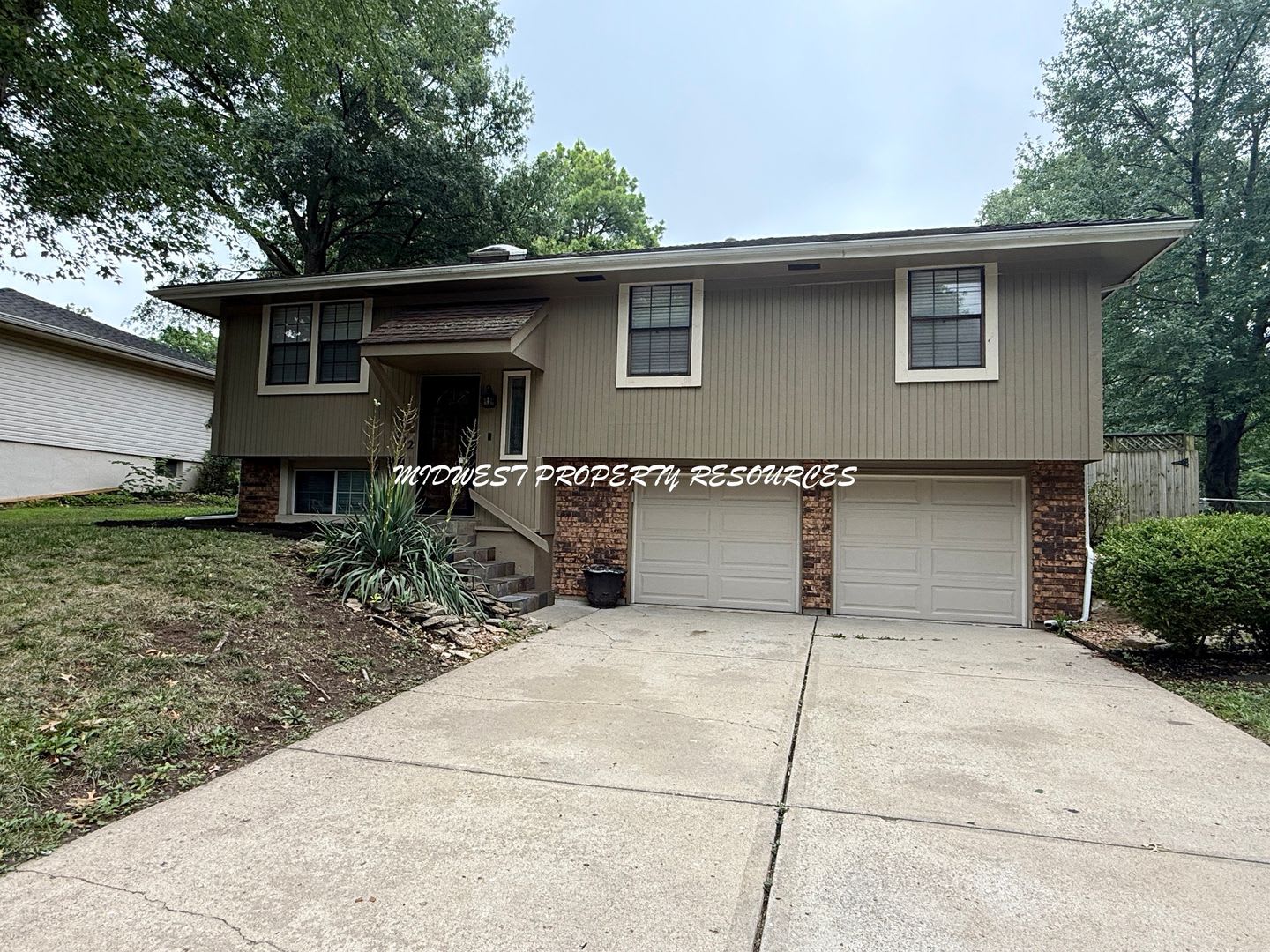 Newly Remodeled 3 Bed, 2.5 Bath Home with Vaulted Ceilings, Finished Basement & Fenced Yard! – photo 2