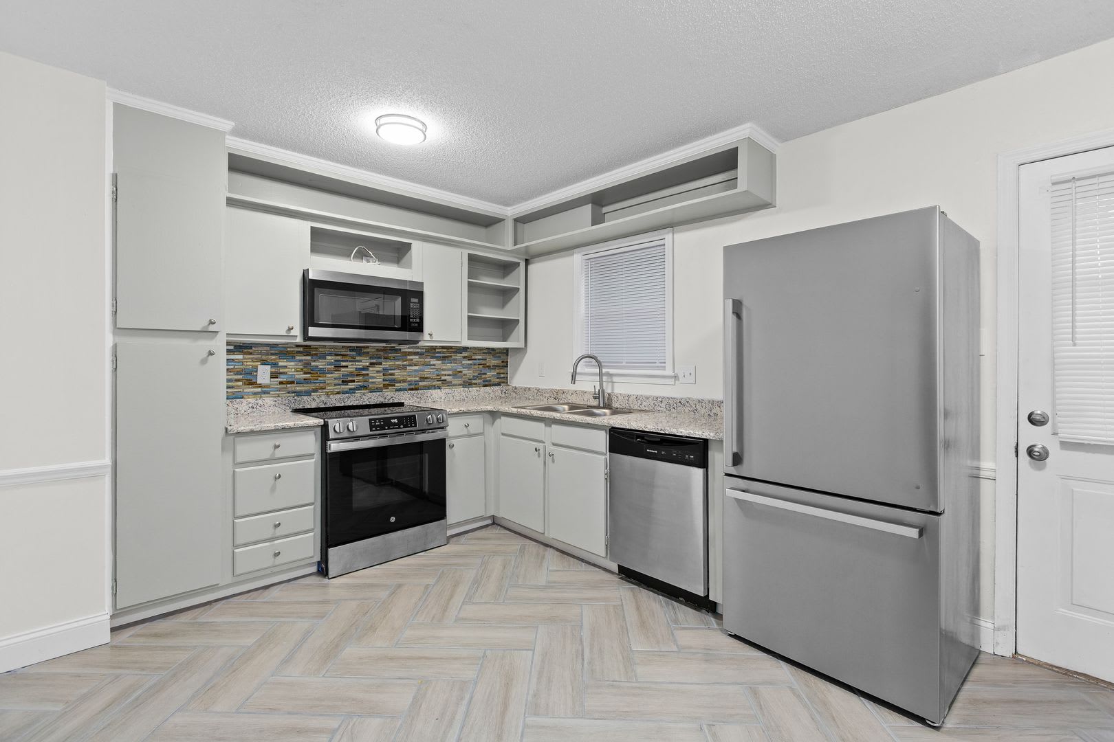 Updated Two Bedroom Condo With New Kitchen Appliances And Private Patio – photo 3