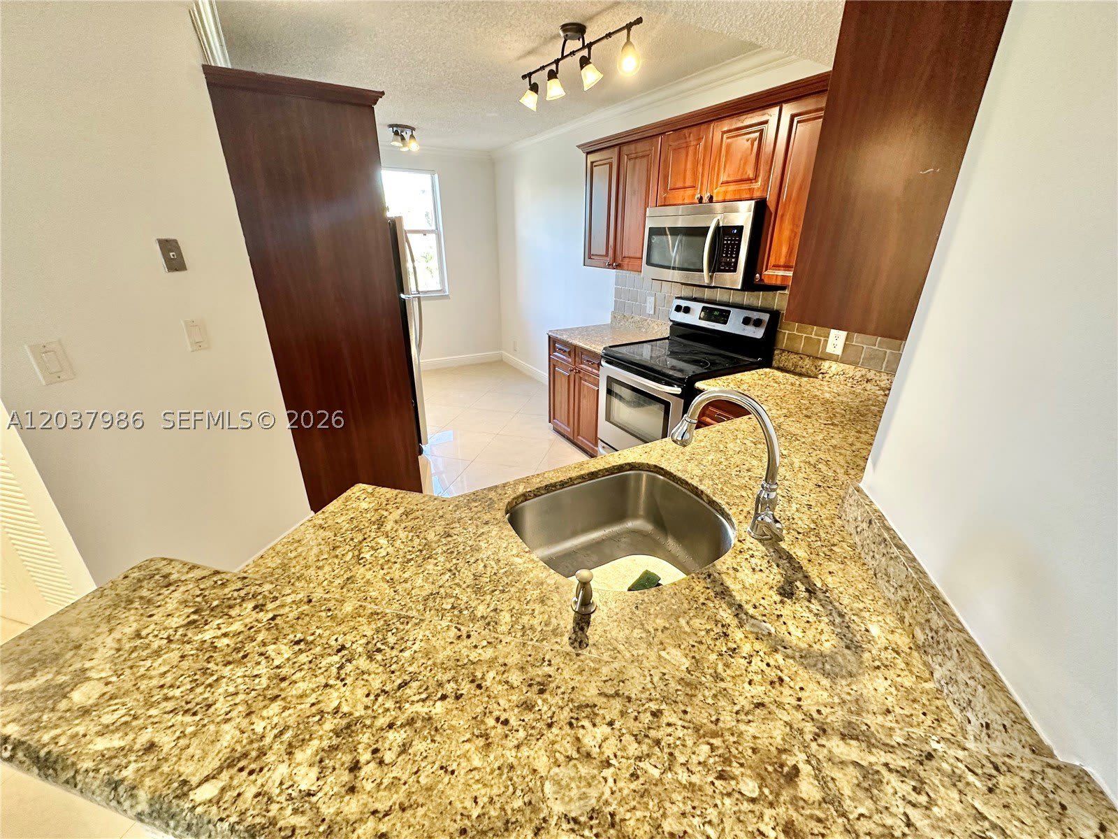 8955 Wiles Rd – photo 4