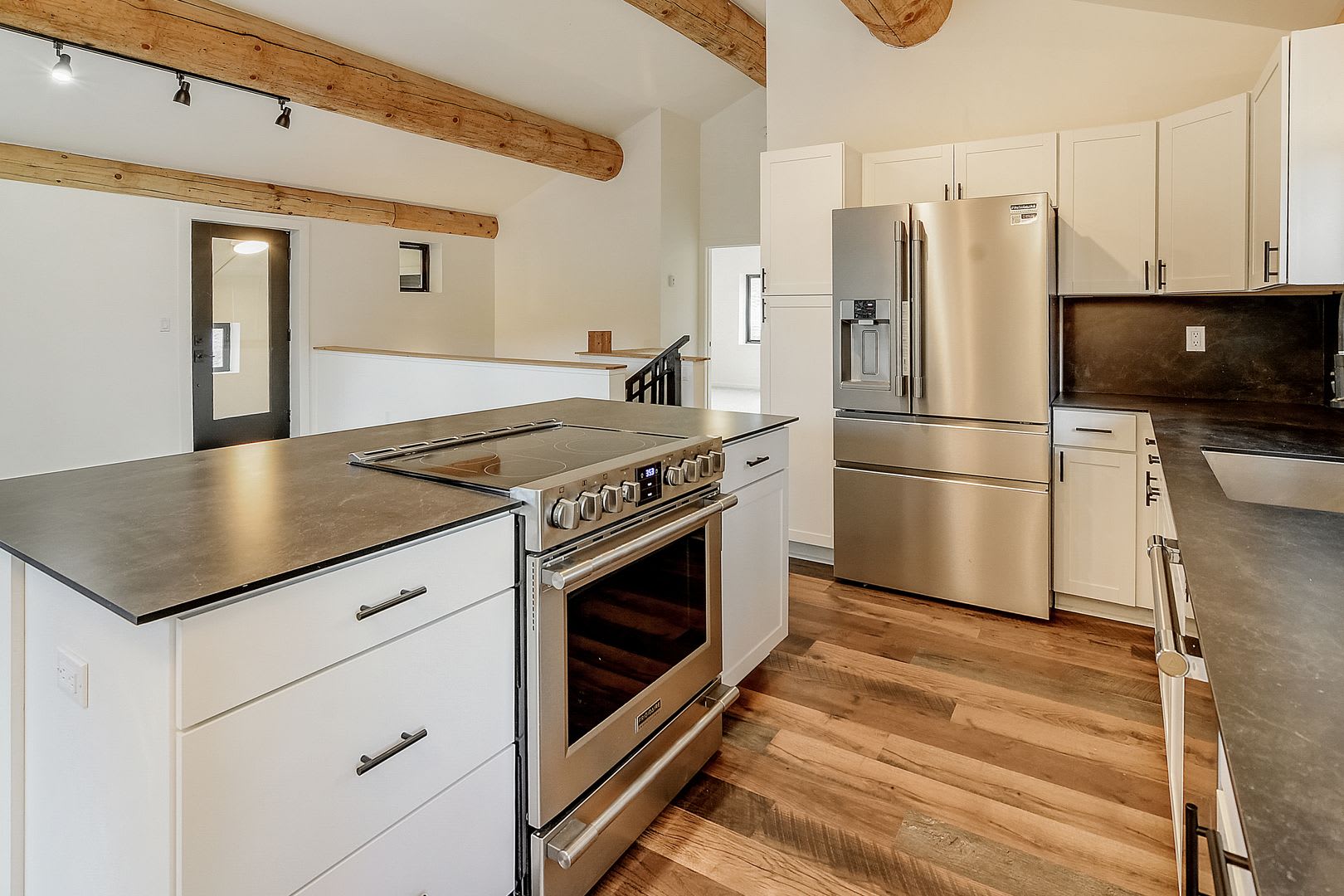New Construction! Great Views! Deck! 20 minutes from Breck! In-floor radiant heat! – photo 3