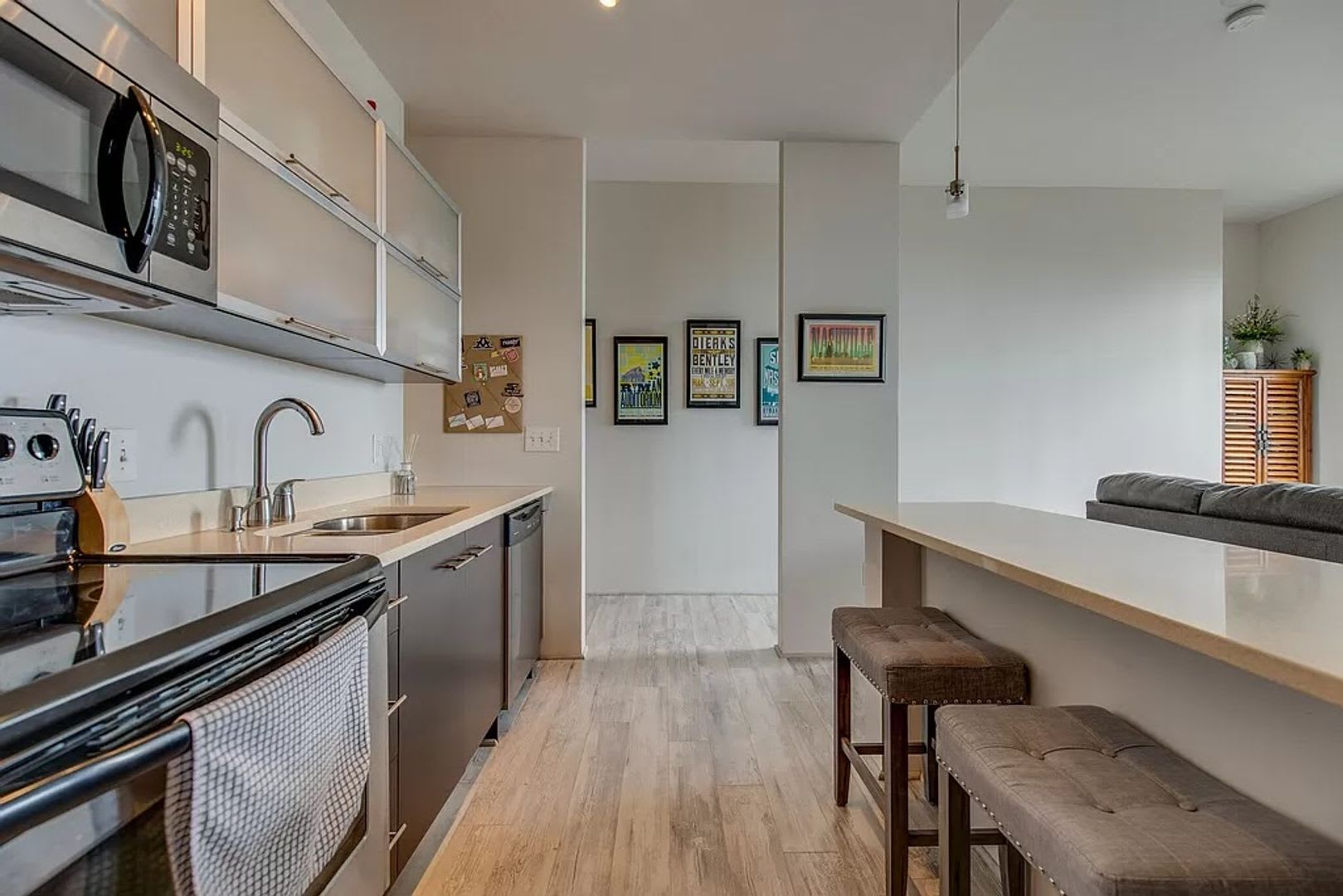 1 Bed/1 Bath Condo at 5th and Main, Assigned Parking, Washer/Dryer/Covered Balcony – photo 2