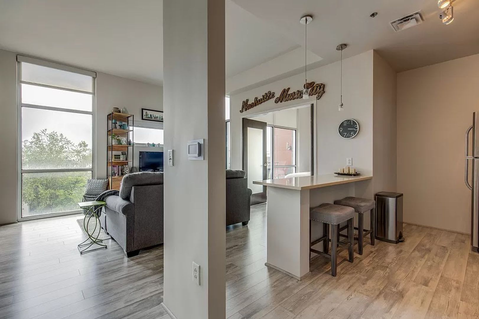 1 Bed/1 Bath Condo at 5th and Main, Assigned Parking, Washer/Dryer/Covered Balcony – photo 1