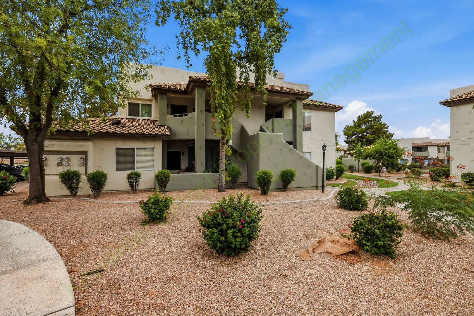 Freshly Updated 2-Bedroom Condo in Gated Lakeshore at Andersen Springs – New Paint & New Carpet! – photo 1