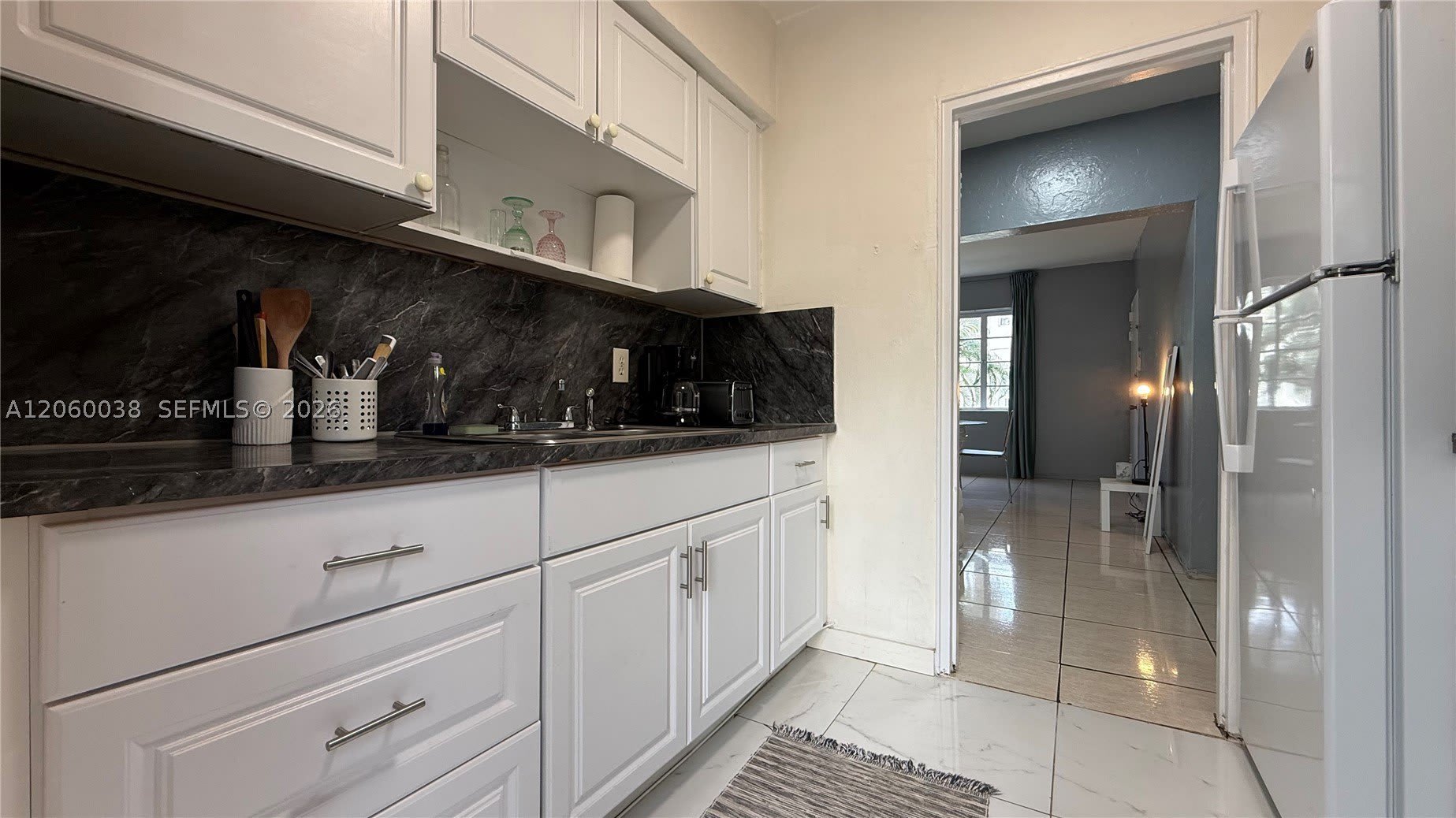 650 84th St – photo 3