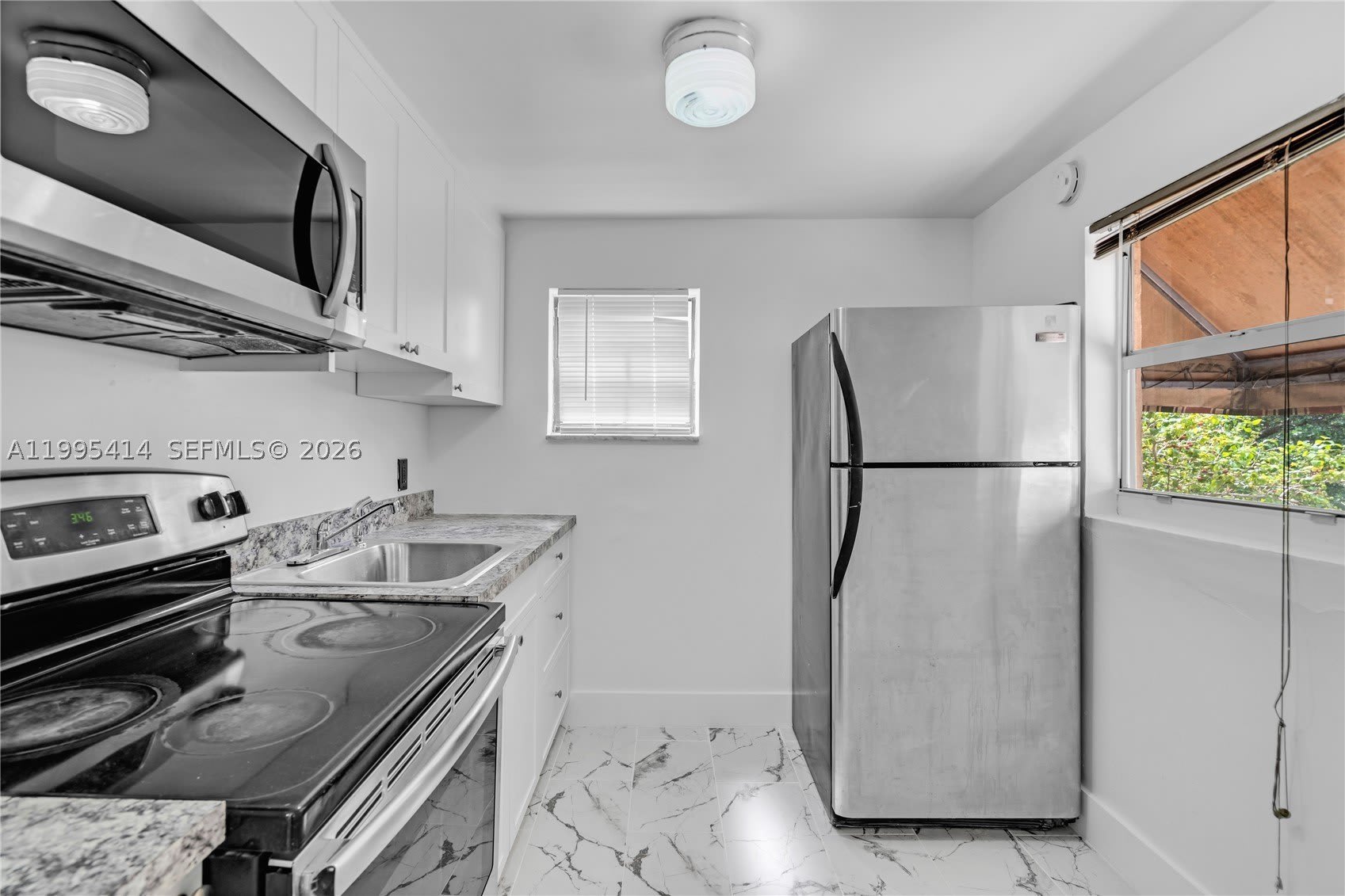 54 NW 62nd St – photo 1
