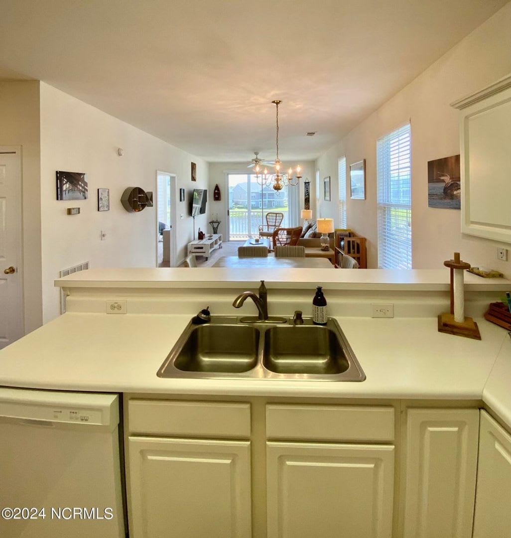 FULLY FURNISHED CONDOMINIUM IS SOUGHT-AFTER SANDPIPER BAY! – photo 4