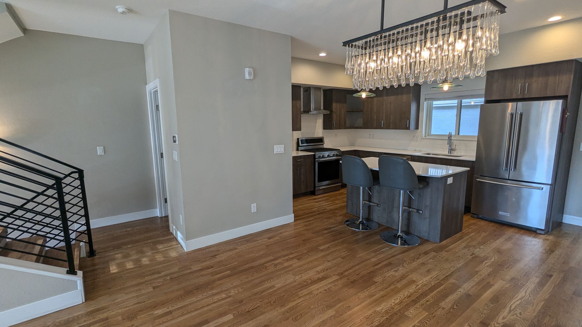 STUNNING 4-LEVEL TOWNHOME IN HIGHLANDS W/ 2-CAR GARAGE +AMAZING ROOFTOP DECK WITH VIEWS! – photo 5