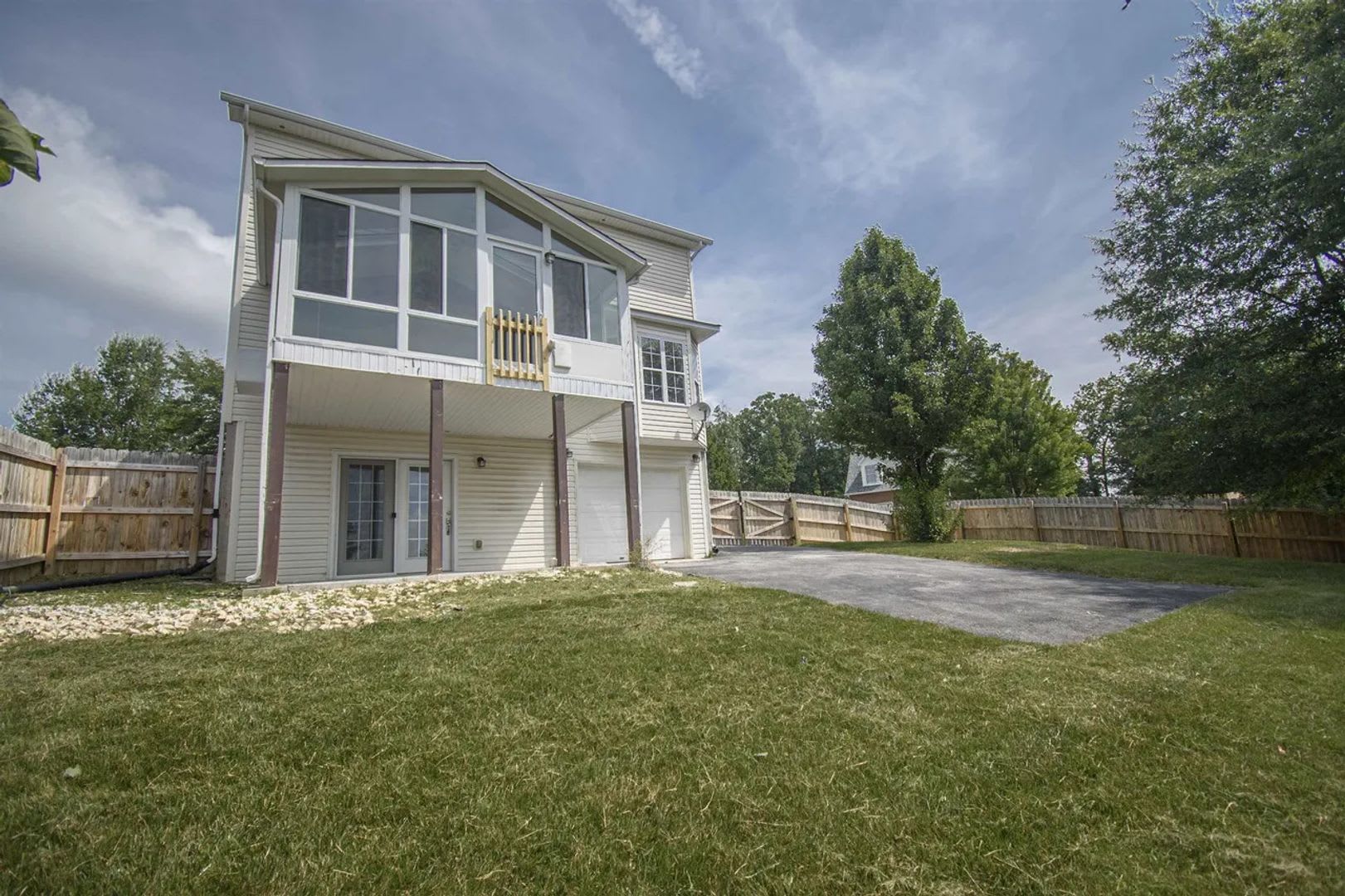 Spacious Home with Beautiful Sunroom & Lawn Care Included – photo 2
