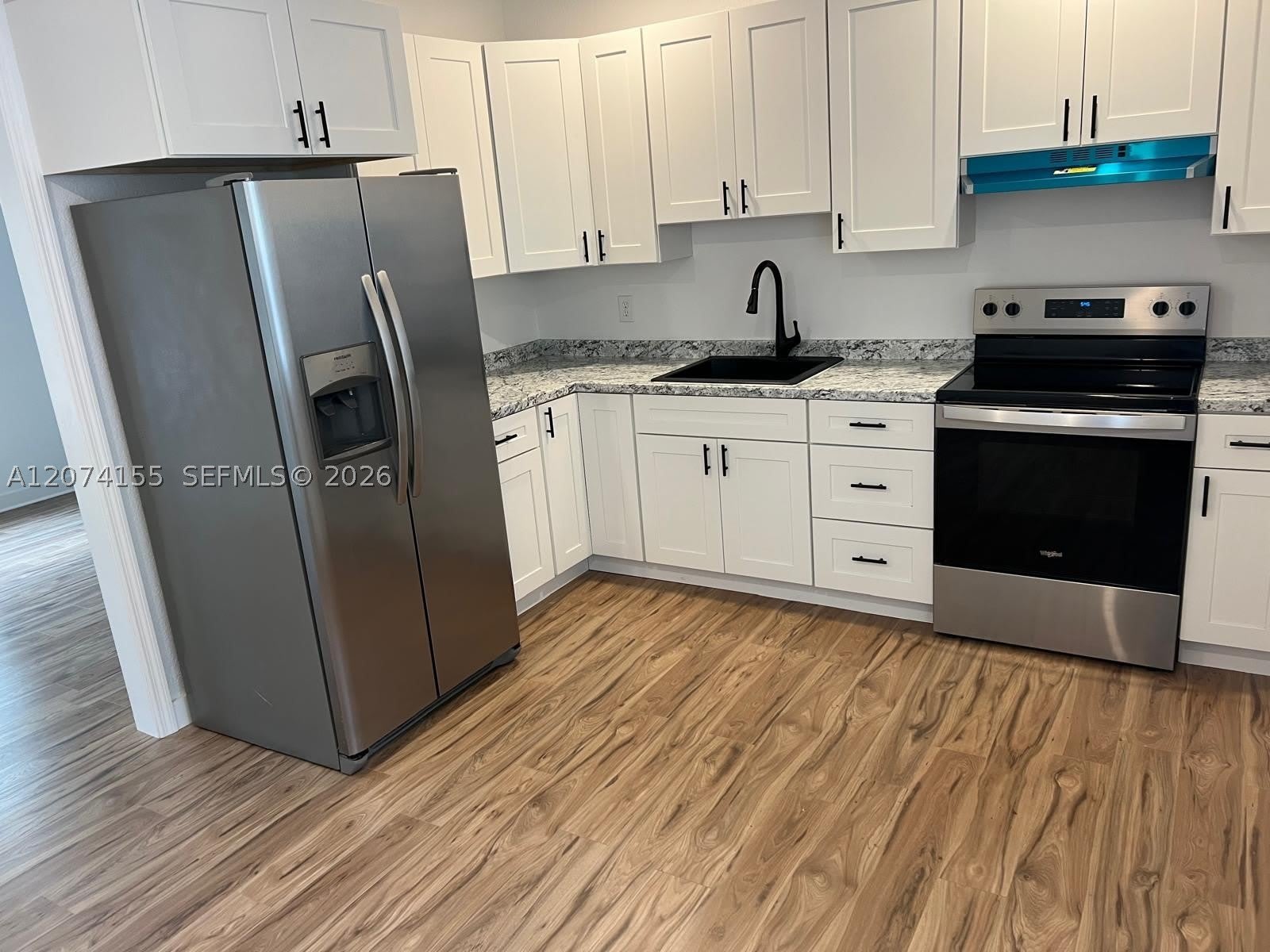 6117 SW 18th St – photo 2