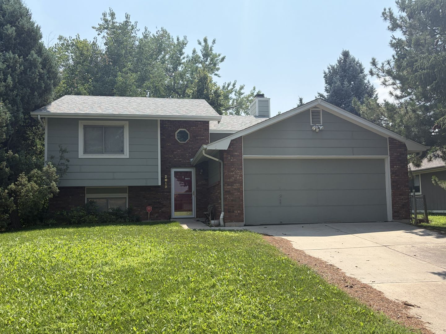 Spacious Split-Level Home with Large Fenced Yard + Garage – photo 1