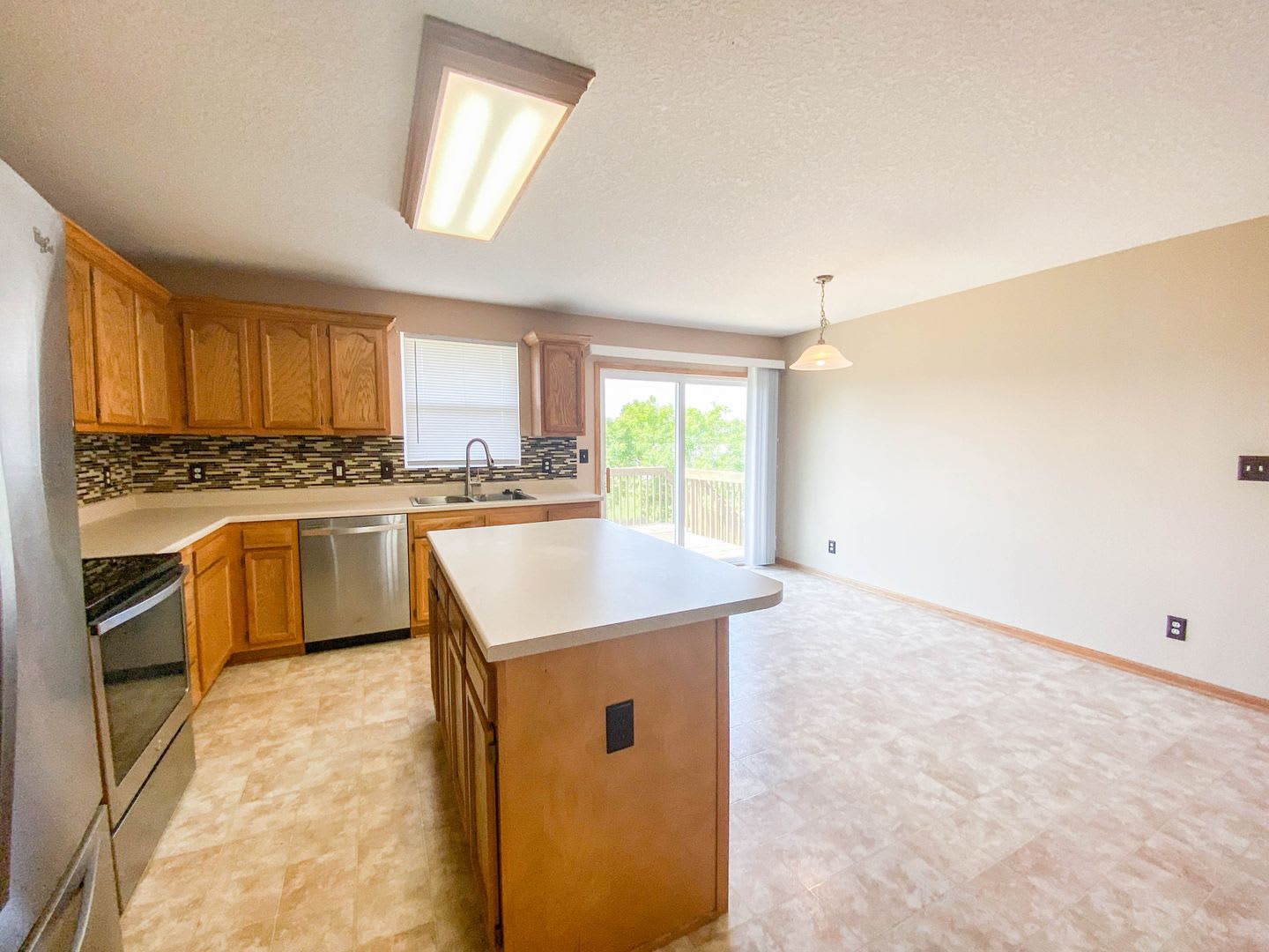 Spacious 3-Bedroom Waukee Home with Fenced Yard, Deck & 2-Car Garage – photo 4