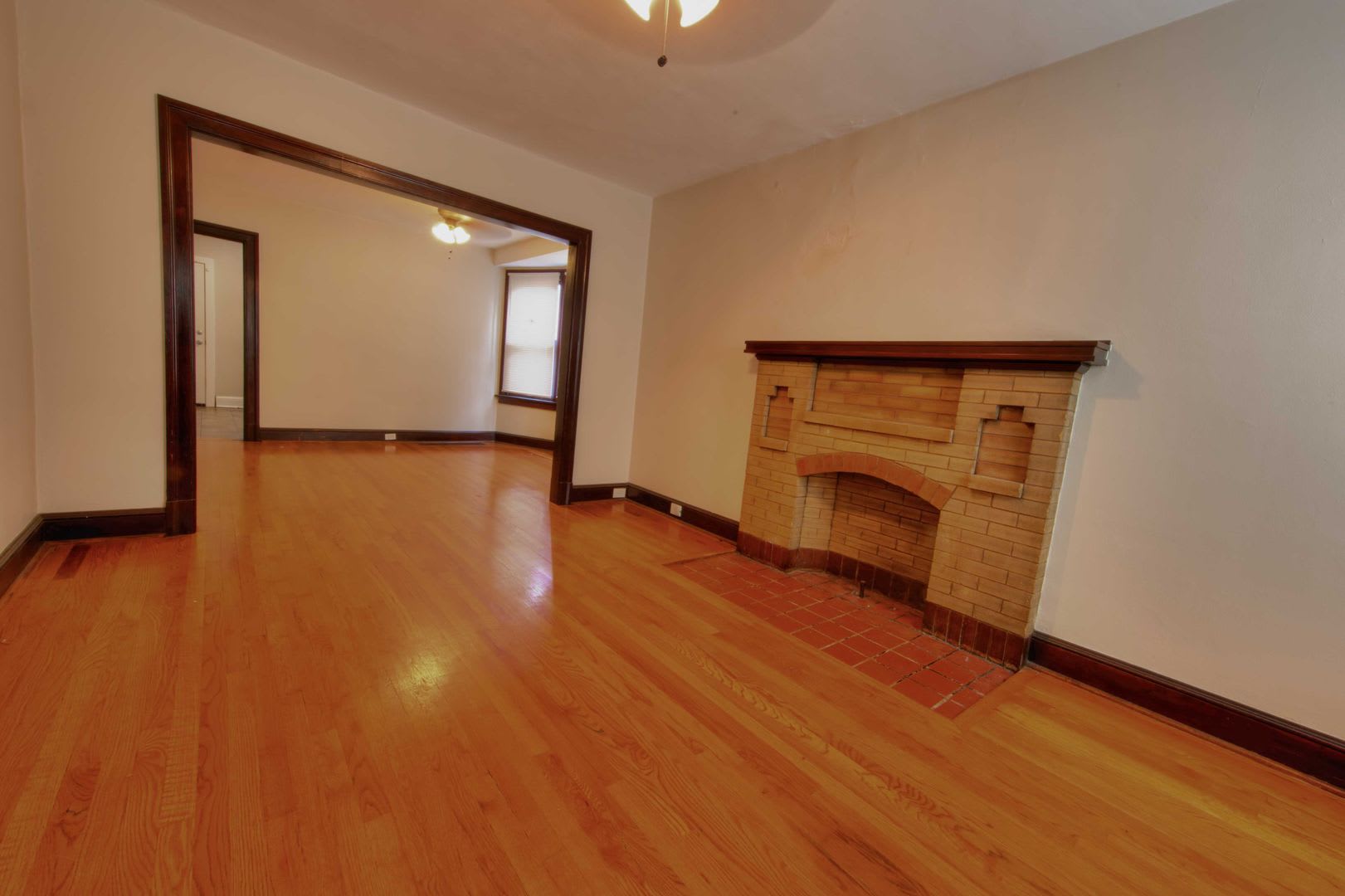 This Completely Refinished Two Bedroom One Bathroom Home Features Brilliant Hardwood Floors Throughout – photo 1