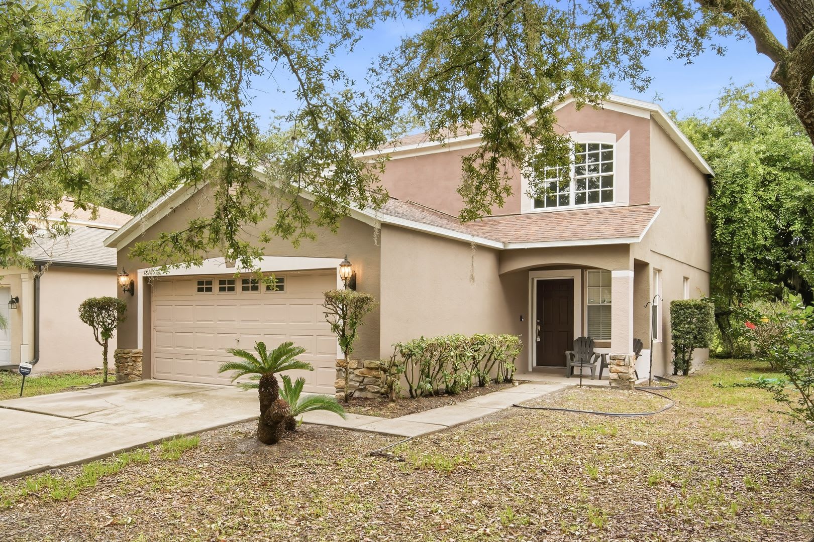 Two-story 4BR/2BA New Tampa home with pond view. – photo 1