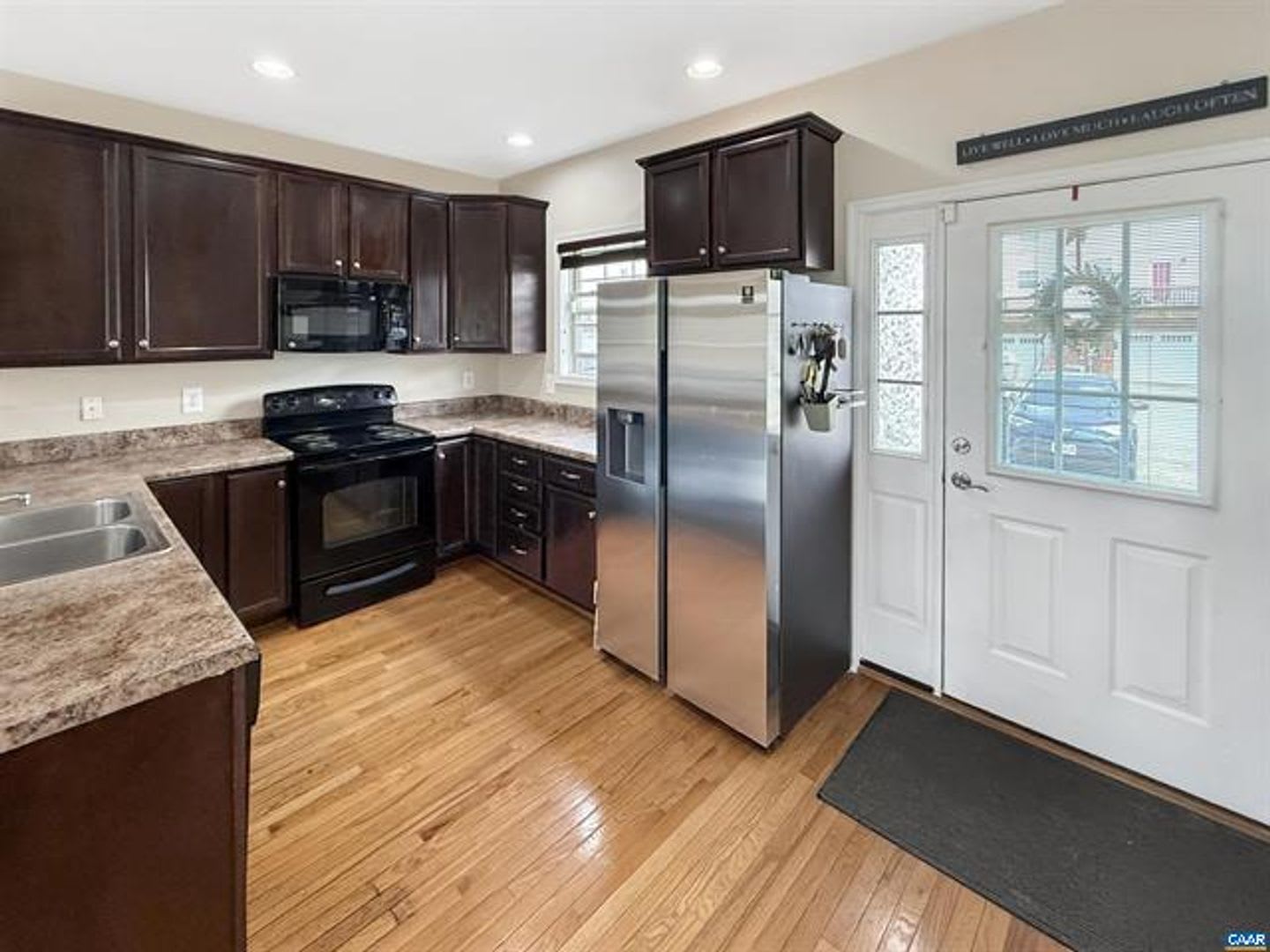 Walk to Bonefish & Target from this like new multi-level 4 bedroom, 3.5 bath townhome! – photo 3